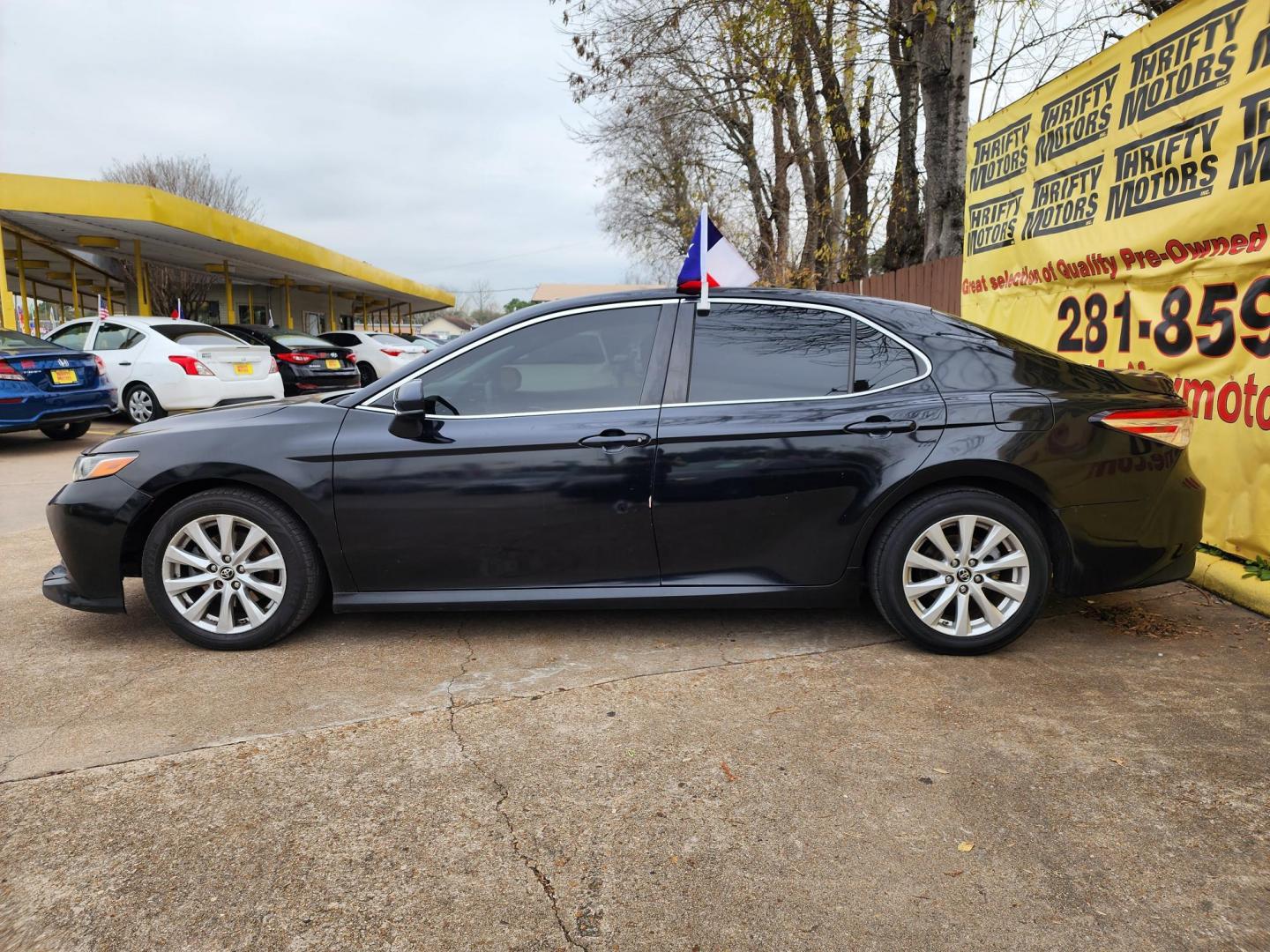 2018 Black /Black Toyota Camry XSE (JTNB11HK9J3) with an 2.5L L4 DOHC 16V engine, Automatic 8-Speed transmission, located at 16710 Clay Rd., Houston, TX, 77084, (281) 859-7900, 29.834864, -95.656166 - Photo#5