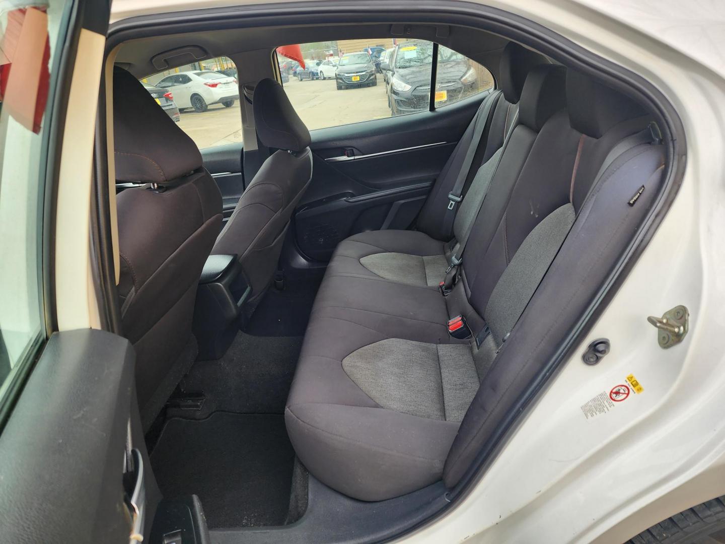 2019 White /Gray Toyota Camry LE (4T1B11HK2KU) with an 2.5L L4 DOHC 16V engine, Automatic 8-Speed transmission, located at 16710 Clay Rd., Houston, TX, 77084, (281) 859-7900, 29.834864, -95.656166 - Photo#10