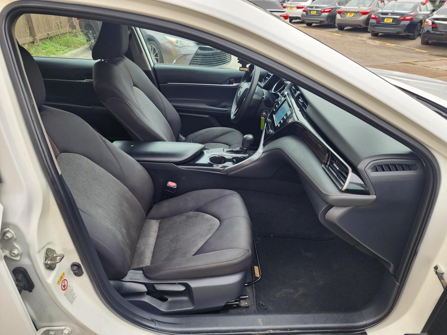 2019 White /Gray Toyota Camry LE (4T1B11HK2KU) with an 2.5L L4 DOHC 16V engine, Automatic 8-Speed transmission, located at 16710 Clay Rd., Houston, TX, 77084, (281) 859-7900, 29.834864, -95.656166 - Photo#11