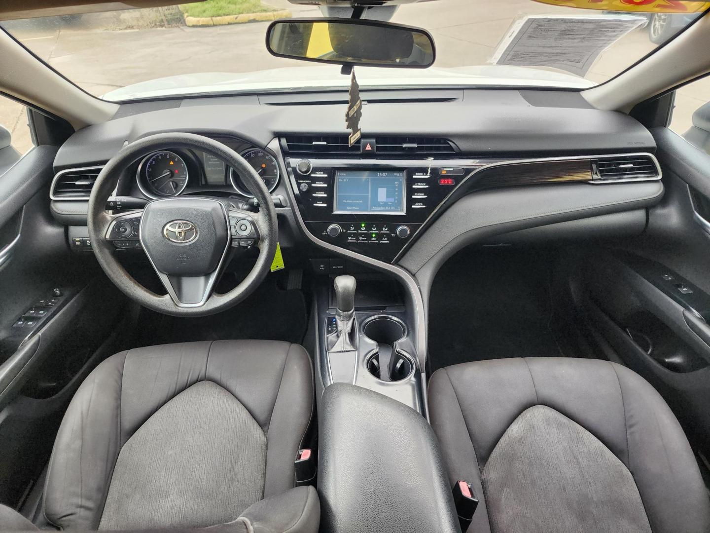 2019 White /Gray Toyota Camry LE (4T1B11HK2KU) with an 2.5L L4 DOHC 16V engine, Automatic 8-Speed transmission, located at 16710 Clay Rd., Houston, TX, 77084, (281) 859-7900, 29.834864, -95.656166 - Photo#7