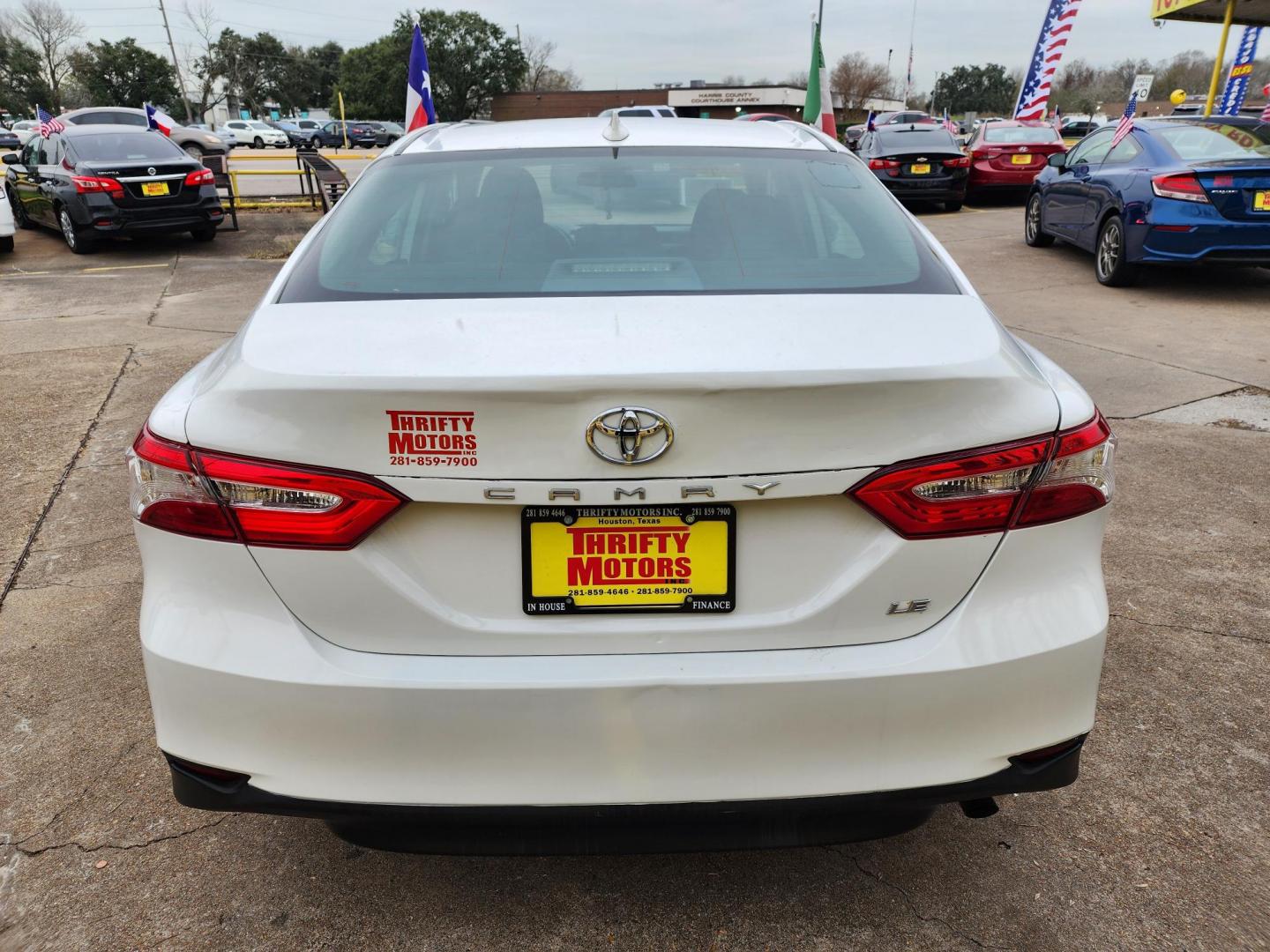 2019 White /Gray Toyota Camry LE (4T1B11HK2KU) with an 2.5L L4 DOHC 16V engine, Automatic 8-Speed transmission, located at 16710 Clay Rd., Houston, TX, 77084, (281) 859-7900, 29.834864, -95.656166 - Photo#5