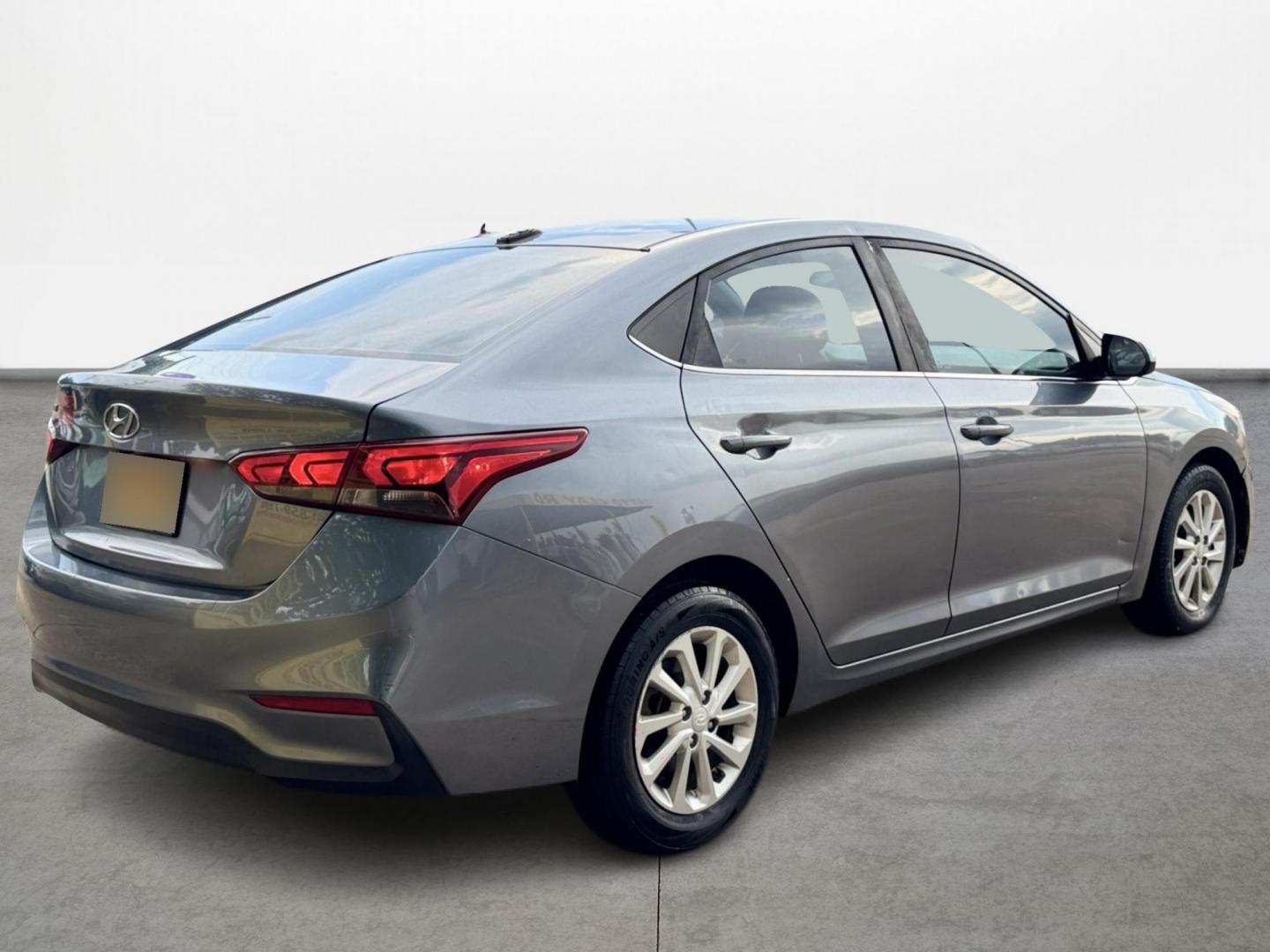 2020 Gray /Gray Hyundai Accent SEL 4-Door 6A (3KPC24A63LE) with an 1.6L L4 DOHC 16V engine, Automatic 6-Speed transmission, located at 16710 Clay Rd., Houston, TX, 77084, (281) 859-7900, 29.834864, -95.656166 - Photo#2