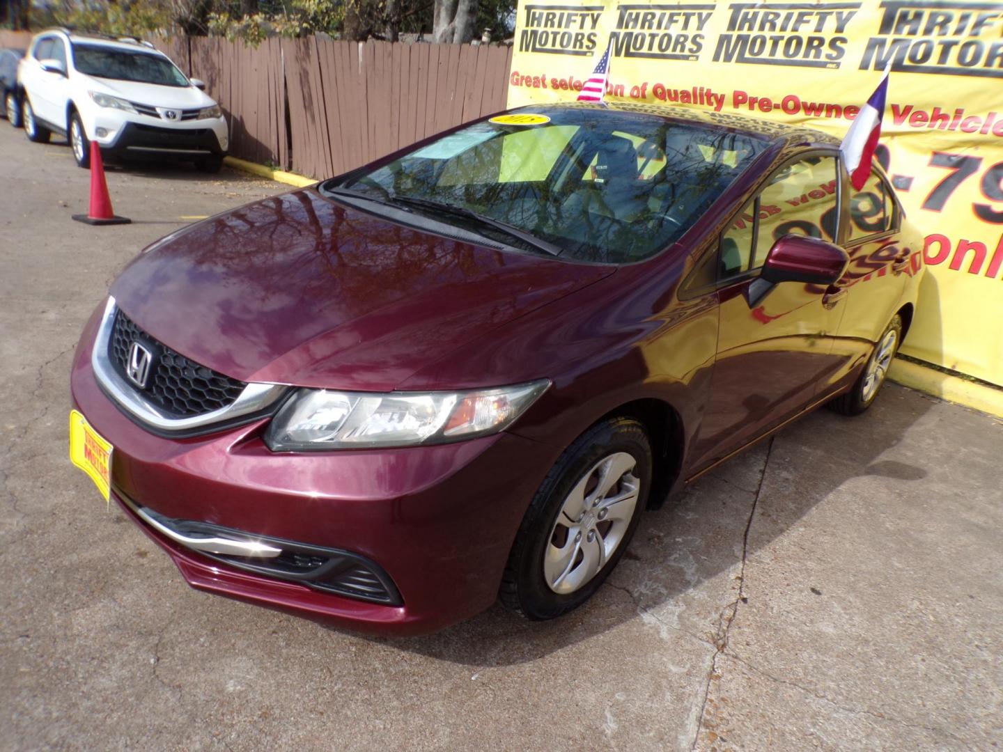 2015 Red /Gray Honda Civic LX Sedan CVT (19XFB2F54FE) with an 1.8L L4 SOHC 16V engine, Continuously Variable Transmission transmission, located at 16710 Clay Rd., Houston, TX, 77084, (281) 859-7900, 29.834864, -95.656166 - Photo#2