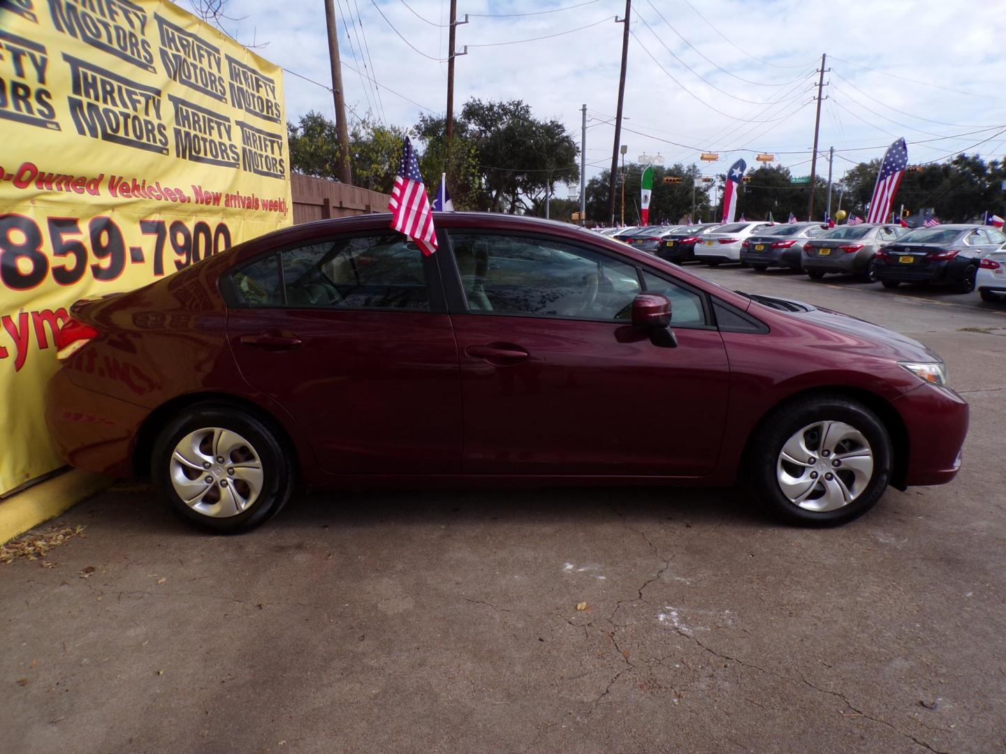 2015 Red /Gray Honda Civic LX Sedan CVT (19XFB2F54FE) with an 1.8L L4 SOHC 16V engine, Continuously Variable Transmission transmission, located at 16710 Clay Rd., Houston, TX, 77084, (281) 859-7900, 29.834864, -95.656166 - Photo#4