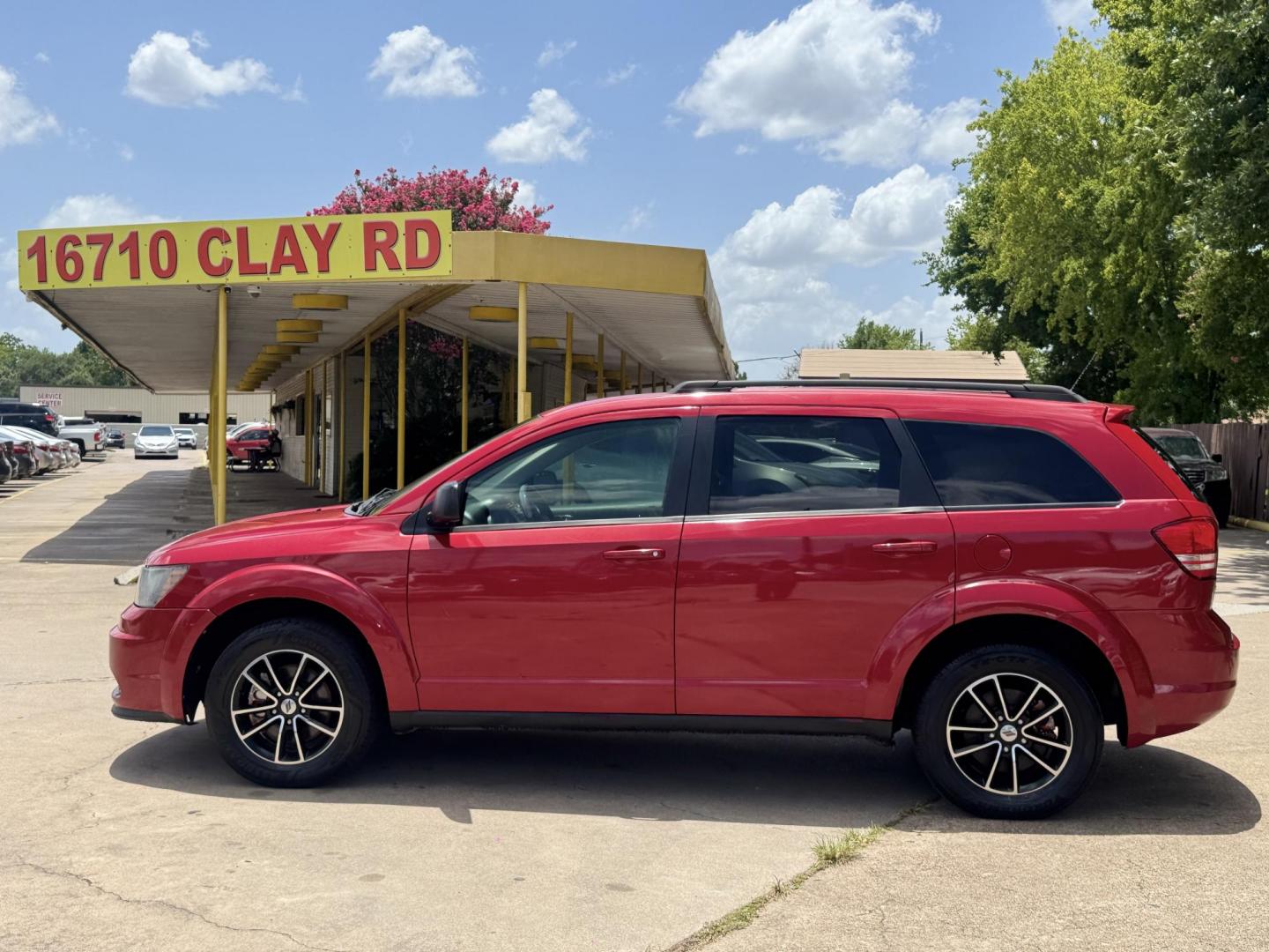 2018 Red /Black Dodge Journey SE (3C4PDCAB0JT) with an 2.4L L4 DOHC 16V engine, Automatic transmission, located at 16710 Clay Rd., Houston, TX, 77084, (281) 859-7900, 29.834864, -95.656166 - Photo#27