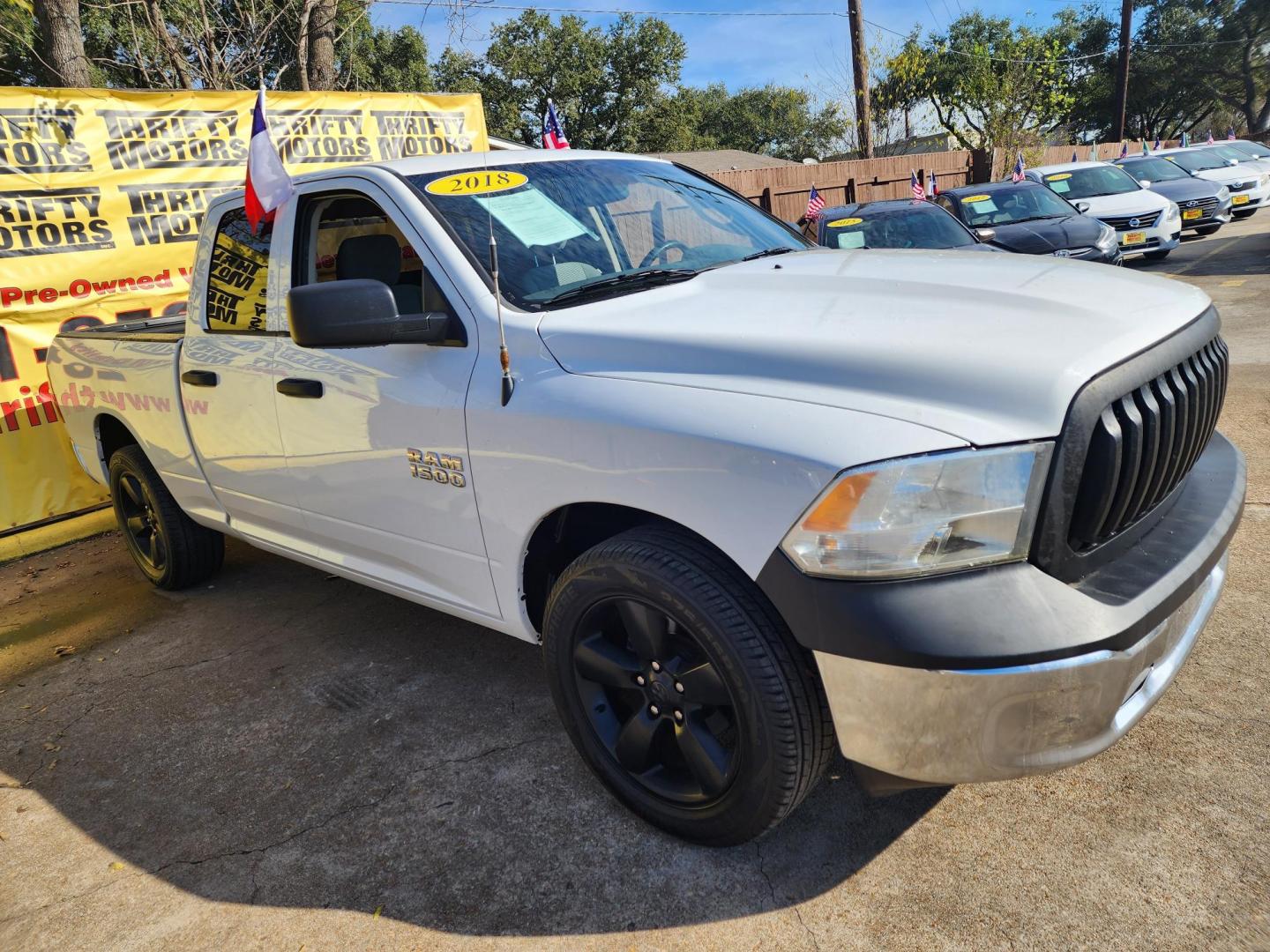 2018 White /Gray RAM 1500 Tradesman Quad Cab 2WD (1C6RR6FG7JS) with an 3.6L V6 DOHC 24V FFV engine, Automatic 8-Speed transmission, located at 16710 Clay Rd., Houston, TX, 77084, (281) 859-7900, 29.834864, -95.656166 - Photo#2