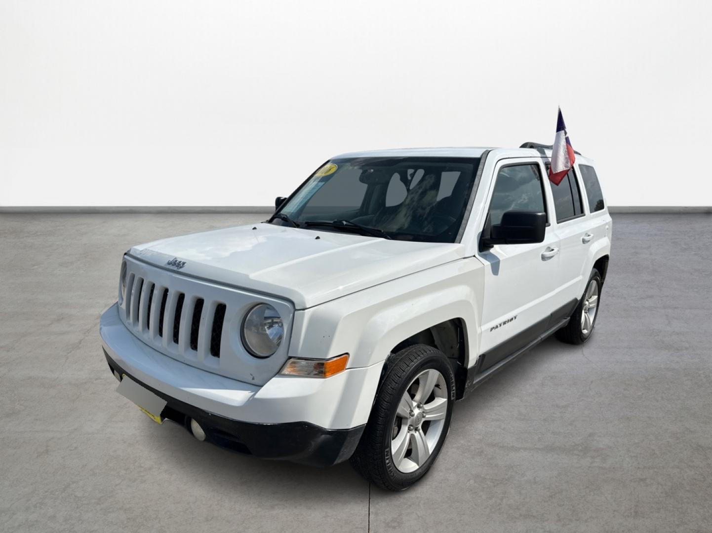 2016 White /Gray Jeep Patriot Latitude 2WD (1C4NJPFBXGD) with an 2.4L L4 DOHC 16V engine, located at 16710 Clay Rd., Houston, TX, 77084, (281) 859-7900, 29.834864, -95.656166 - Photo#0