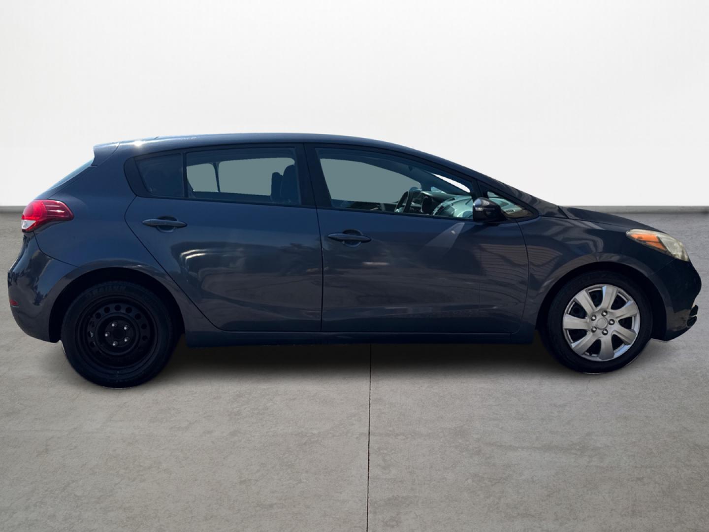 2016 Blue /Gray Kia Forte 5-Door LX (KNAFK5A80G5) with an 2.0L L4 DOHC 16V engine, Automatic 6-Speed transmission, located at 16710 Clay Rd., Houston, TX, 77084, (281) 859-7900, 29.834864, -95.656166 - Photo#1