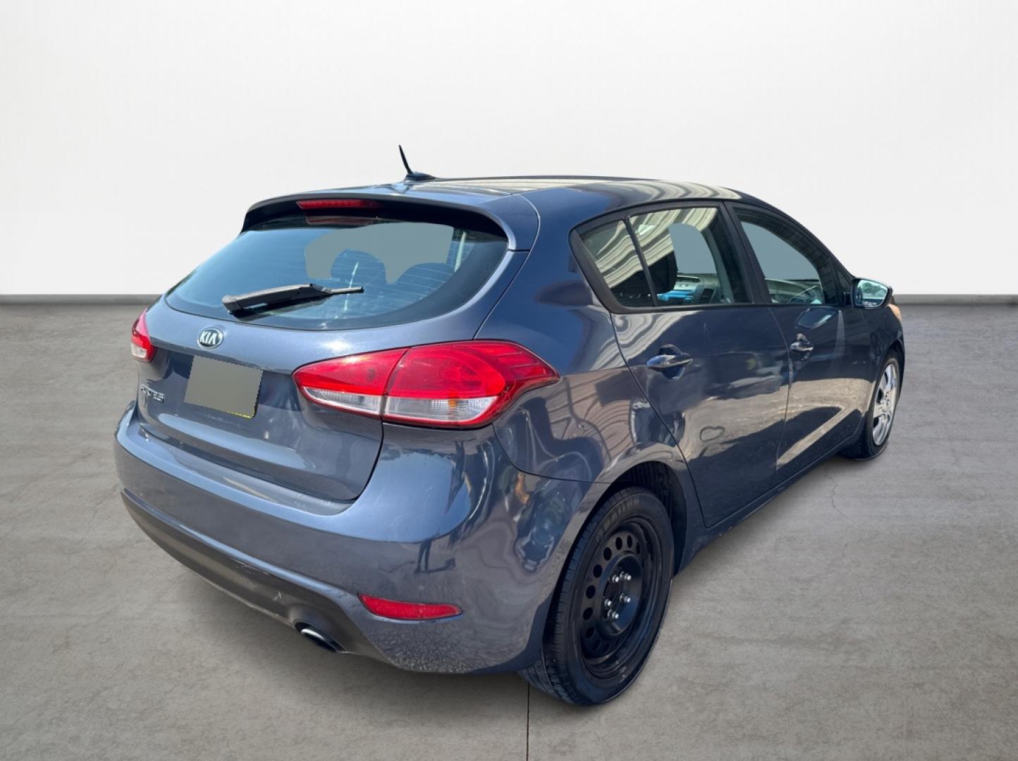 2016 Blue /Gray Kia Forte 5-Door LX (KNAFK5A80G5) with an 2.0L L4 DOHC 16V engine, Automatic 6-Speed transmission, located at 16710 Clay Rd., Houston, TX, 77084, (281) 859-7900, 29.834864, -95.656166 - Photo#2