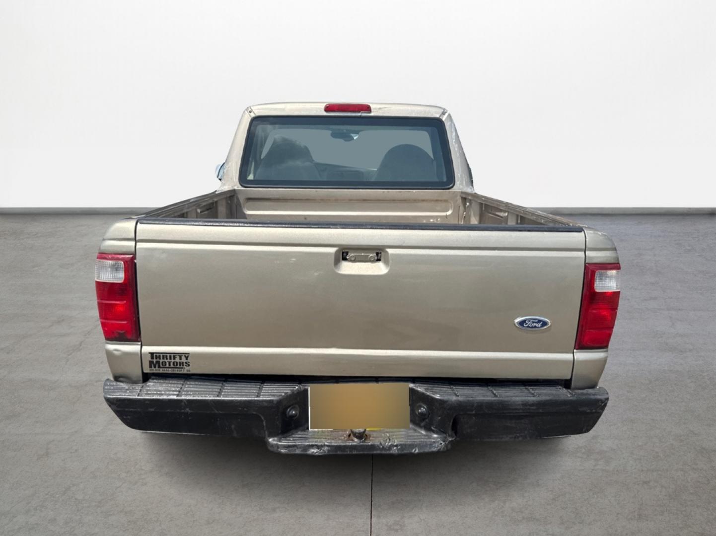 2003 Gold /Beige Ford Ranger XL Short Bed 2WD - 311A (1FTYR10D63P) with an 2.3L L4 SOHC 8V engine, Automatic 6-Speed transmission, located at 16710 Clay Rd., Houston, TX, 77084, (281) 859-7900, 29.834864, -95.656166 - Photo#3