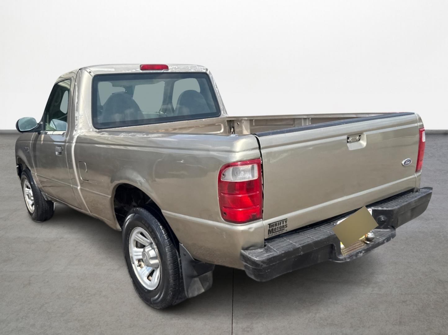2003 Gold /Beige Ford Ranger XL Short Bed 2WD - 311A (1FTYR10D63P) with an 2.3L L4 SOHC 8V engine, Automatic 6-Speed transmission, located at 16710 Clay Rd., Houston, TX, 77084, (281) 859-7900, 29.834864, -95.656166 - Photo#4