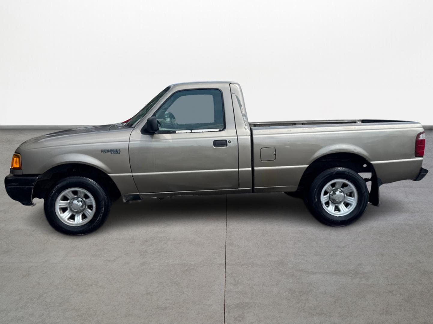 2003 Gold /Beige Ford Ranger XL Short Bed 2WD - 311A (1FTYR10D63P) with an 2.3L L4 SOHC 8V engine, Automatic 6-Speed transmission, located at 16710 Clay Rd., Houston, TX, 77084, (281) 859-7900, 29.834864, -95.656166 - Photo#5
