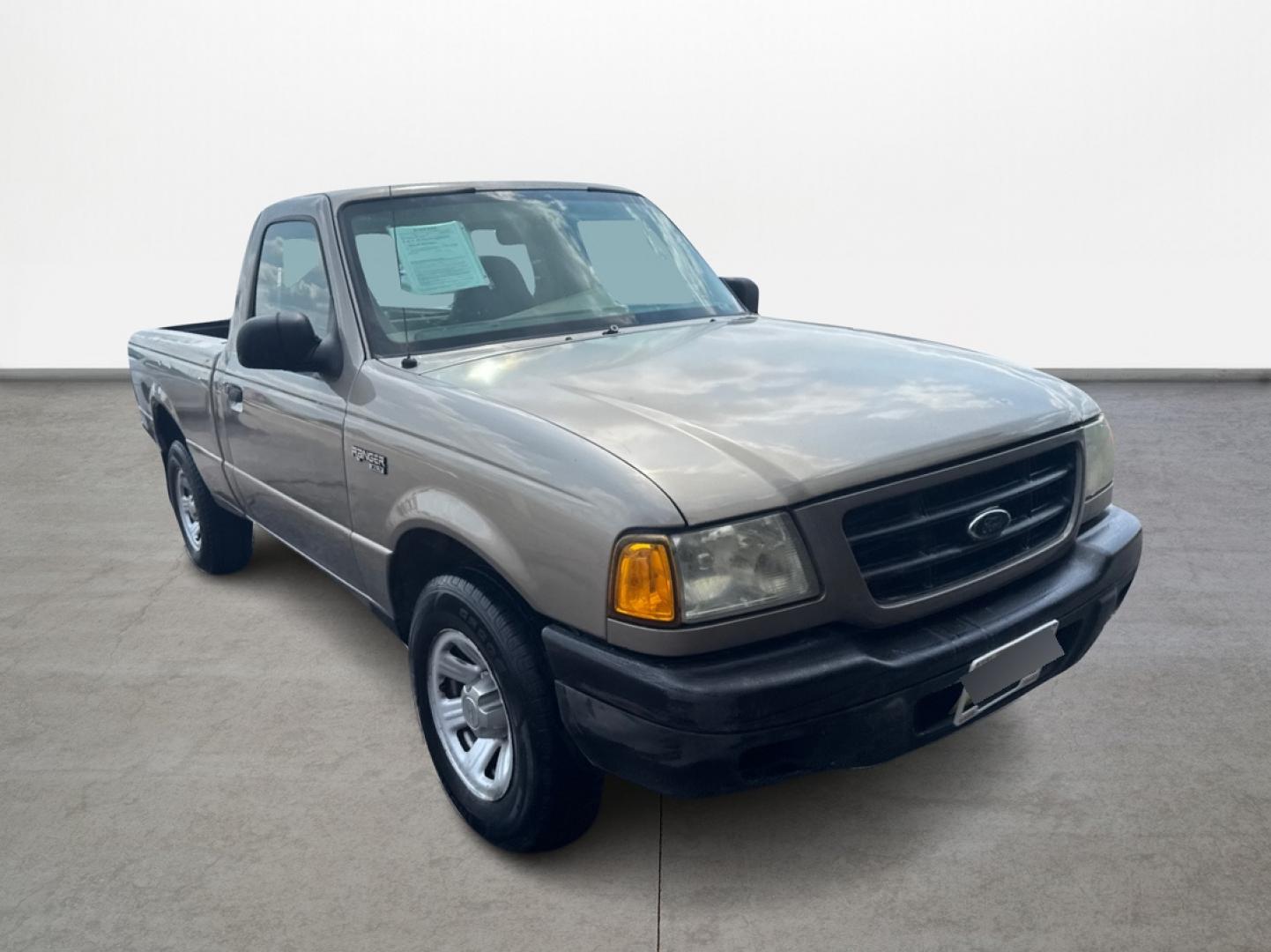 2003 Gold /Beige Ford Ranger XL Short Bed 2WD - 311A (1FTYR10D63P) with an 2.3L L4 SOHC 8V engine, Automatic 6-Speed transmission, located at 16710 Clay Rd., Houston, TX, 77084, (281) 859-7900, 29.834864, -95.656166 - Photo#0