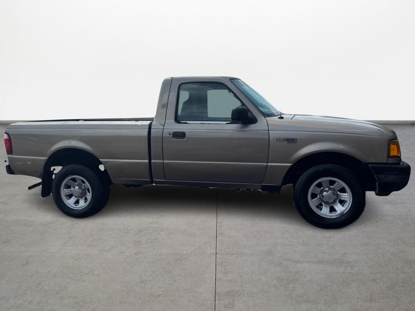 2003 Gold /Beige Ford Ranger XL Short Bed 2WD - 311A (1FTYR10D63P) with an 2.3L L4 SOHC 8V engine, Automatic 6-Speed transmission, located at 16710 Clay Rd., Houston, TX, 77084, (281) 859-7900, 29.834864, -95.656166 - Photo#6