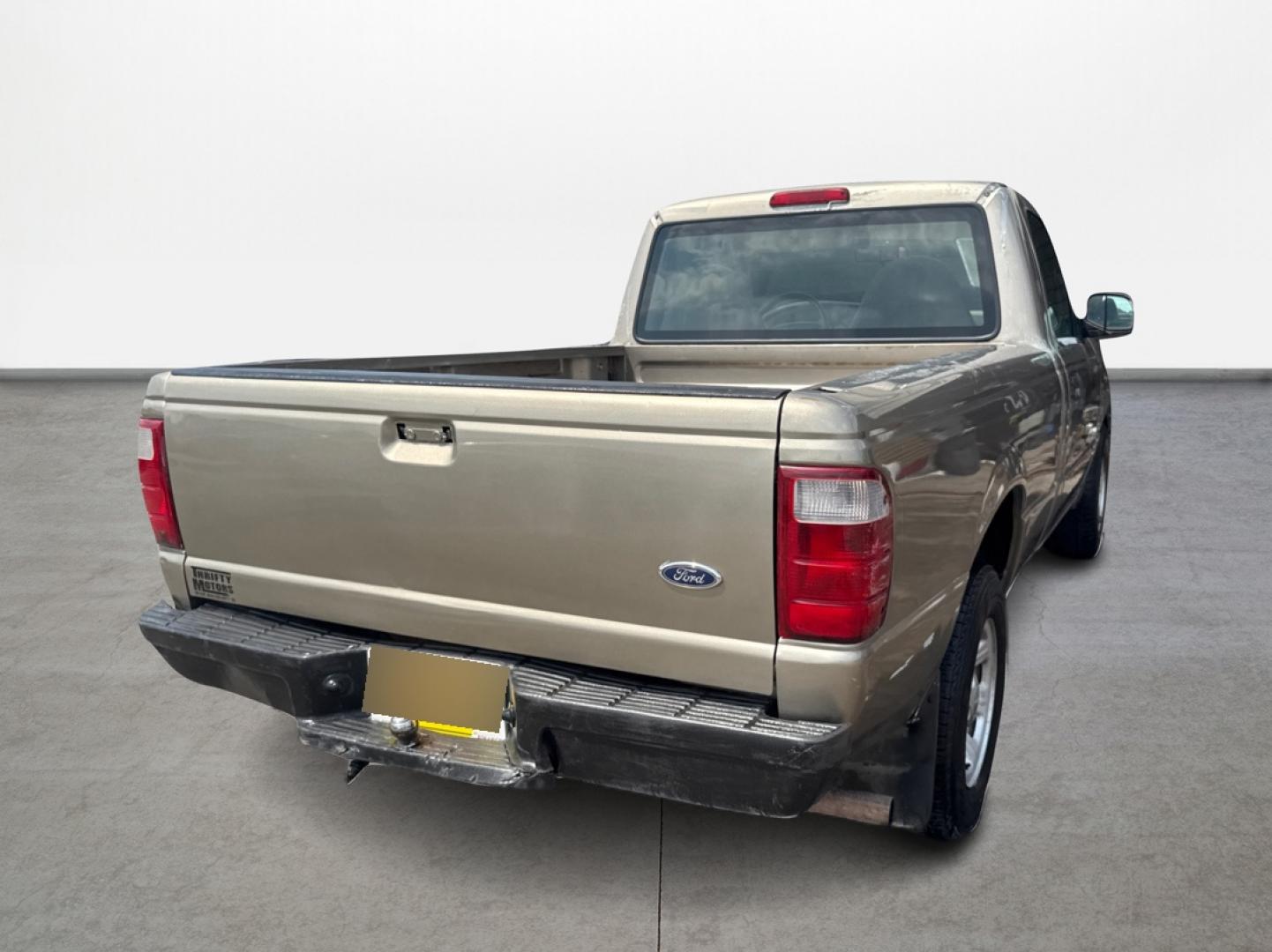 2003 Gold /Beige Ford Ranger XL Short Bed 2WD - 311A (1FTYR10D63P) with an 2.3L L4 SOHC 8V engine, Automatic 6-Speed transmission, located at 16710 Clay Rd., Houston, TX, 77084, (281) 859-7900, 29.834864, -95.656166 - Photo#14