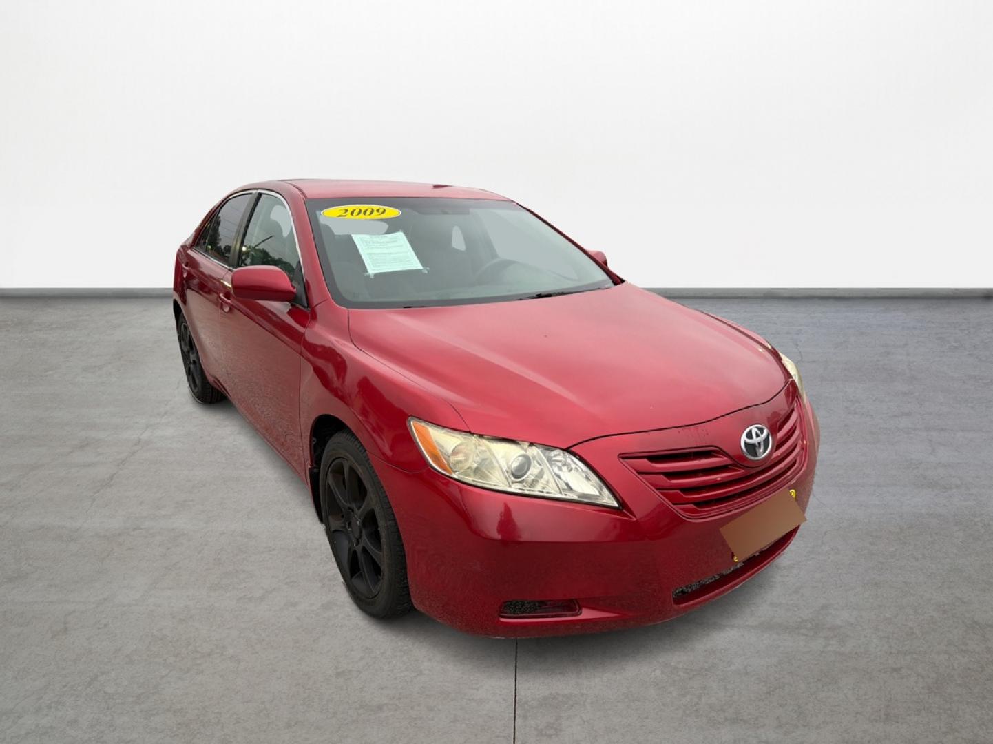 2009 Red /Gray Toyota Camry CE 5-Spd AT (4T4BE46K79R) with an 2.4L L4 DOHC 16V engine, Automatic 5-Speed transmission, located at 16710 Clay Rd., Houston, TX, 77084, (281) 859-7900, 29.834864, -95.656166 - Photo#10