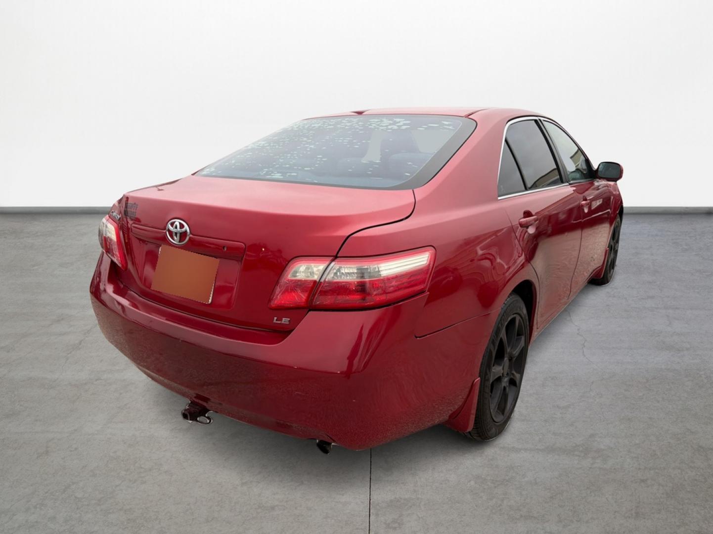 2009 Red /Gray Toyota Camry CE 5-Spd AT (4T4BE46K79R) with an 2.4L L4 DOHC 16V engine, Automatic 5-Speed transmission, located at 16710 Clay Rd., Houston, TX, 77084, (281) 859-7900, 29.834864, -95.656166 - Photo#12