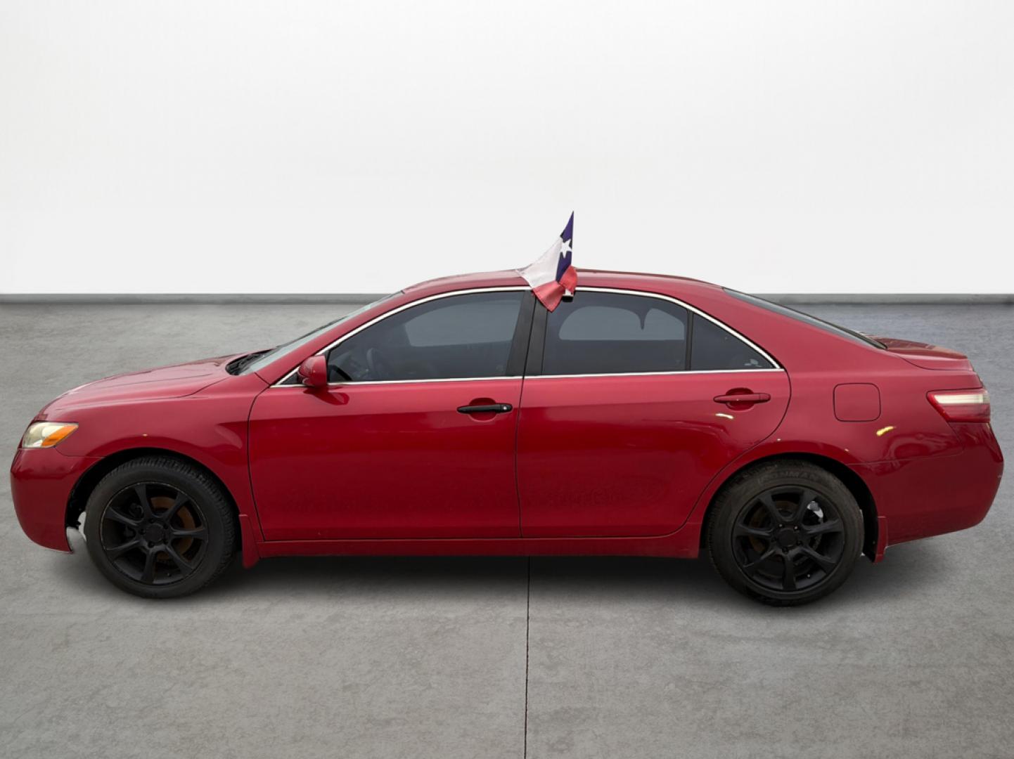 2009 Red /Gray Toyota Camry CE 5-Spd AT (4T4BE46K79R) with an 2.4L L4 DOHC 16V engine, Automatic 5-Speed transmission, located at 16710 Clay Rd., Houston, TX, 77084, (281) 859-7900, 29.834864, -95.656166 - Photo#15
