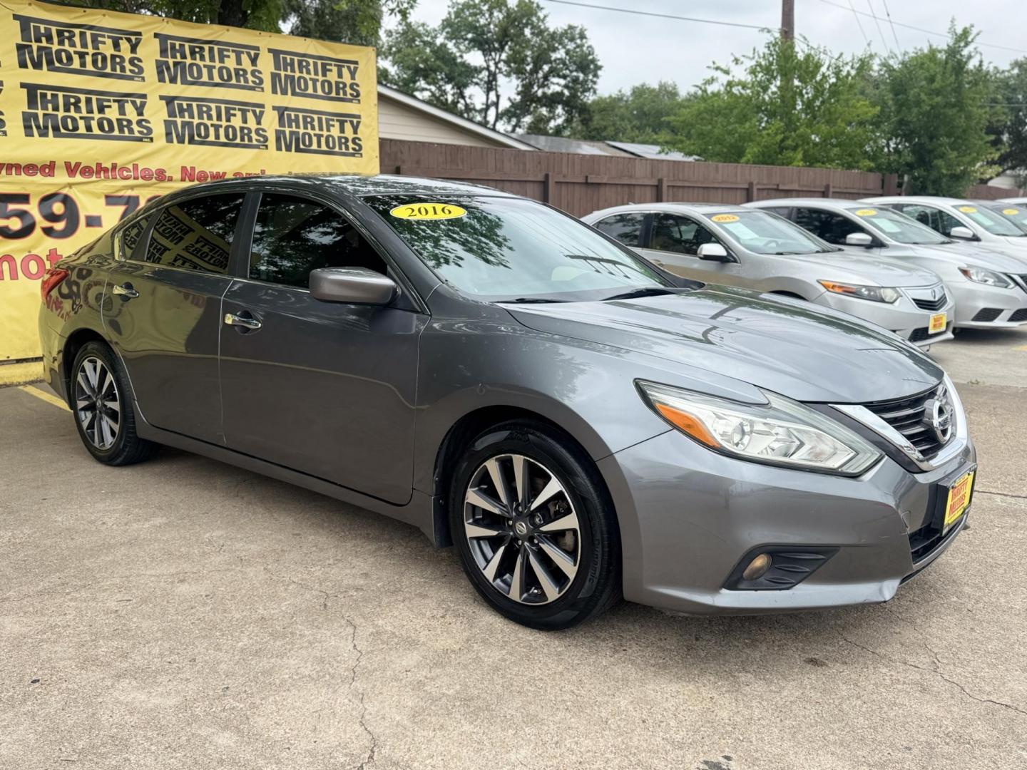 2016 Gray /Tan Nissan Altima 2.5 SL (1N4AL3APXGC) with an 2.5L L4 DOHC 16V engine, CVT transmission, located at 16710 Clay Rd., Houston, TX, 77084, (281) 859-7900, 29.834864, -95.656166 - Photo#2