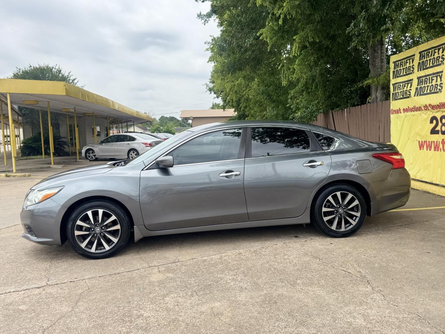 2016 Gray /Tan Nissan Altima 2.5 SL (1N4AL3APXGC) with an 2.5L L4 DOHC 16V engine, CVT transmission, located at 16710 Clay Rd., Houston, TX, 77084, (281) 859-7900, 29.834864, -95.656166 - Photo#7