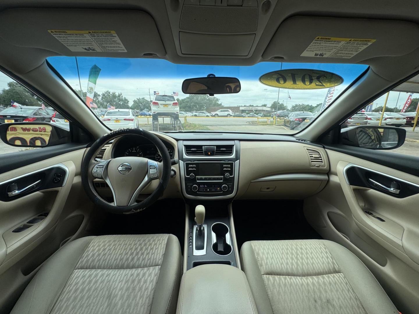 2016 Gray /Tan Nissan Altima 2.5 SL (1N4AL3APXGC) with an 2.5L L4 DOHC 16V engine, CVT transmission, located at 16710 Clay Rd., Houston, TX, 77084, (281) 859-7900, 29.834864, -95.656166 - Photo#16