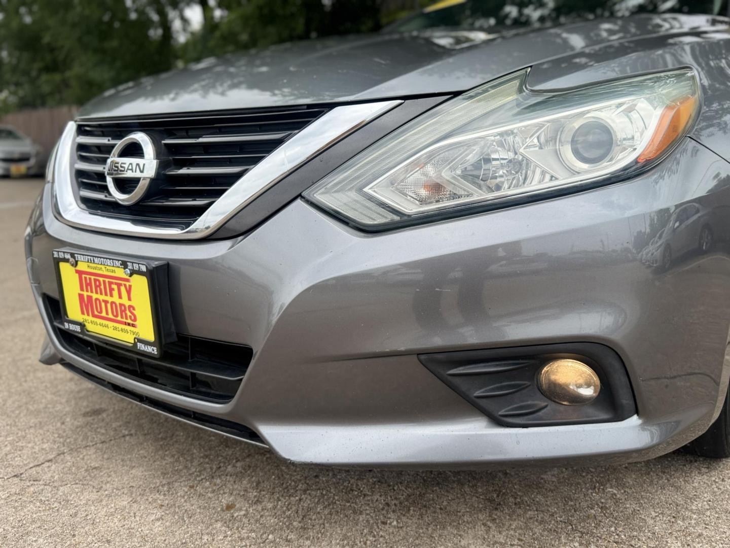 2016 Gray /Tan Nissan Altima 2.5 SL (1N4AL3APXGC) with an 2.5L L4 DOHC 16V engine, CVT transmission, located at 16710 Clay Rd., Houston, TX, 77084, (281) 859-7900, 29.834864, -95.656166 - Photo#19