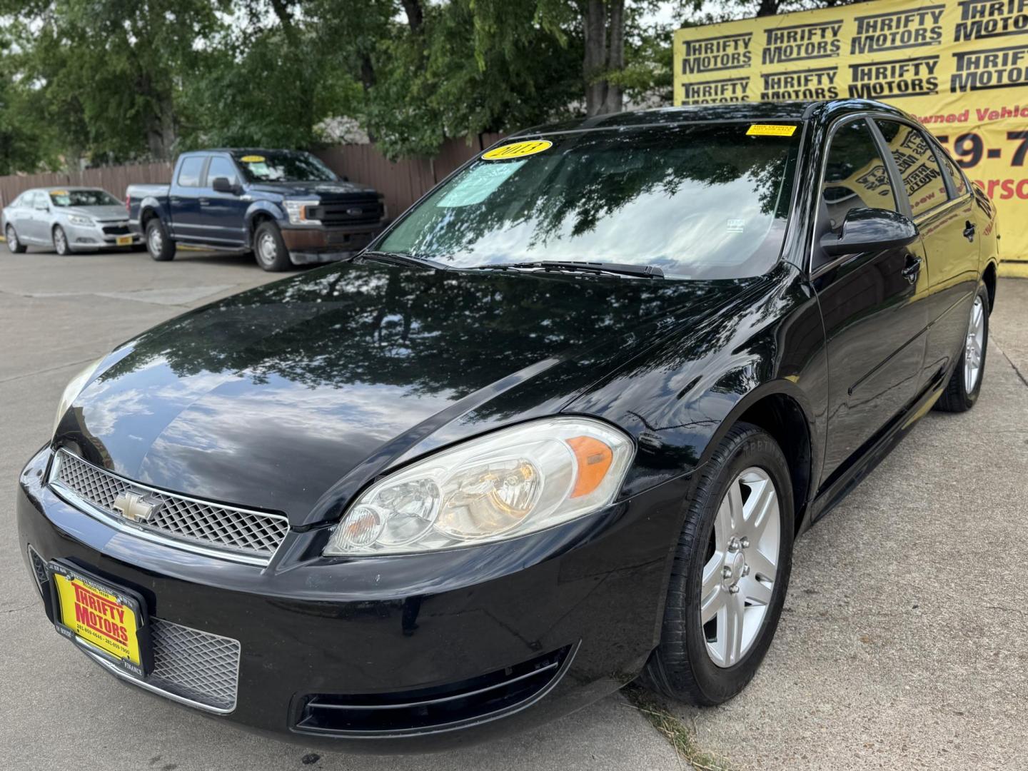 2013 Black /gray Chevrolet Impala LT (Fleet) (2G1WG5E30D1) with an 3.6L V6 DOHC 16V FFV engine, 6-Speed Automatic transmission, located at 16710 Clay Rd., Houston, TX, 77084, (281) 859-7900, 29.834864, -95.656166 - Photo#2