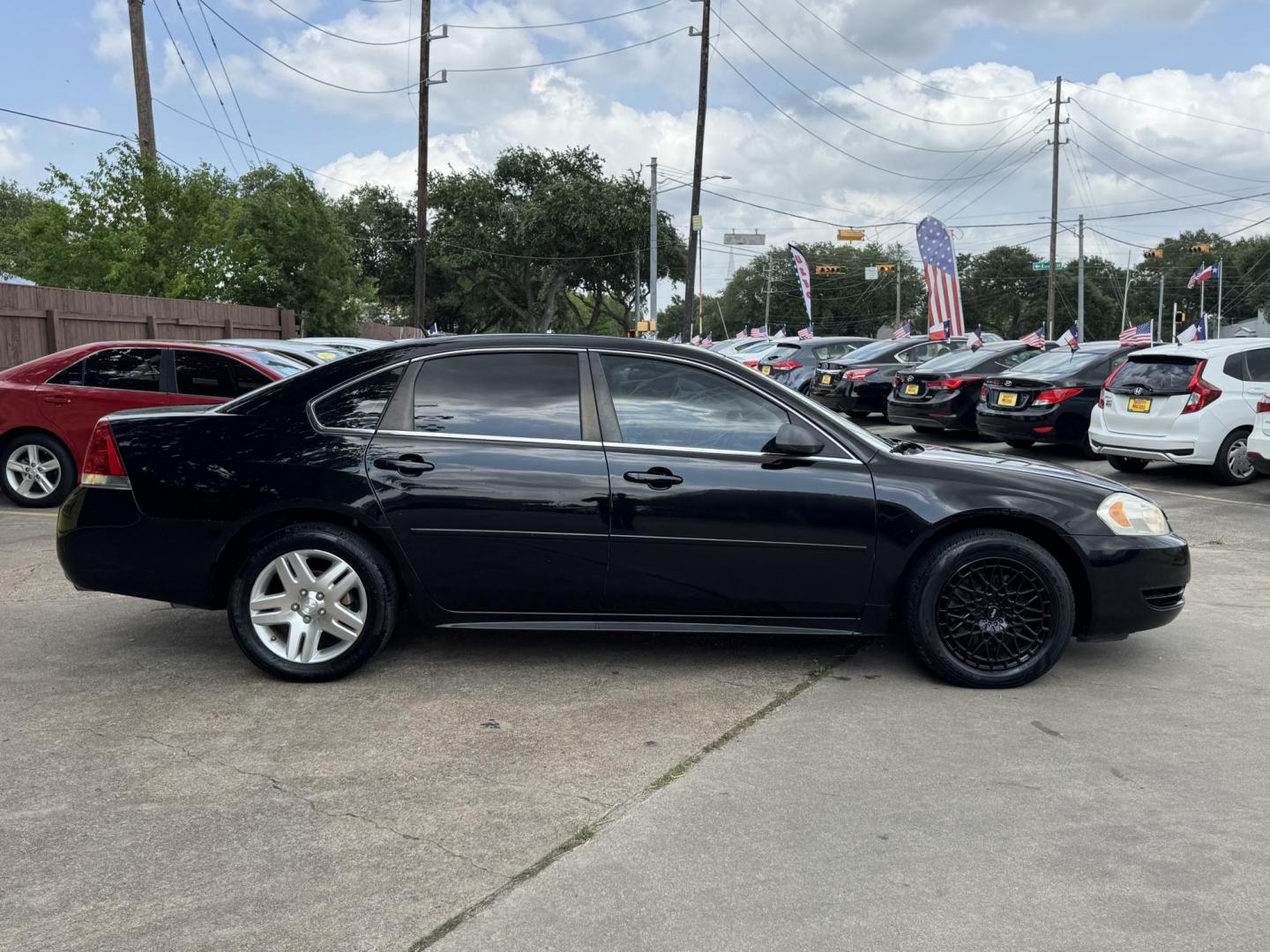 2013 Black /gray Chevrolet Impala LT (Fleet) (2G1WG5E30D1) with an 3.6L V6 DOHC 16V FFV engine, 6-Speed Automatic transmission, located at 16710 Clay Rd., Houston, TX, 77084, (281) 859-7900, 29.834864, -95.656166 - Photo#3