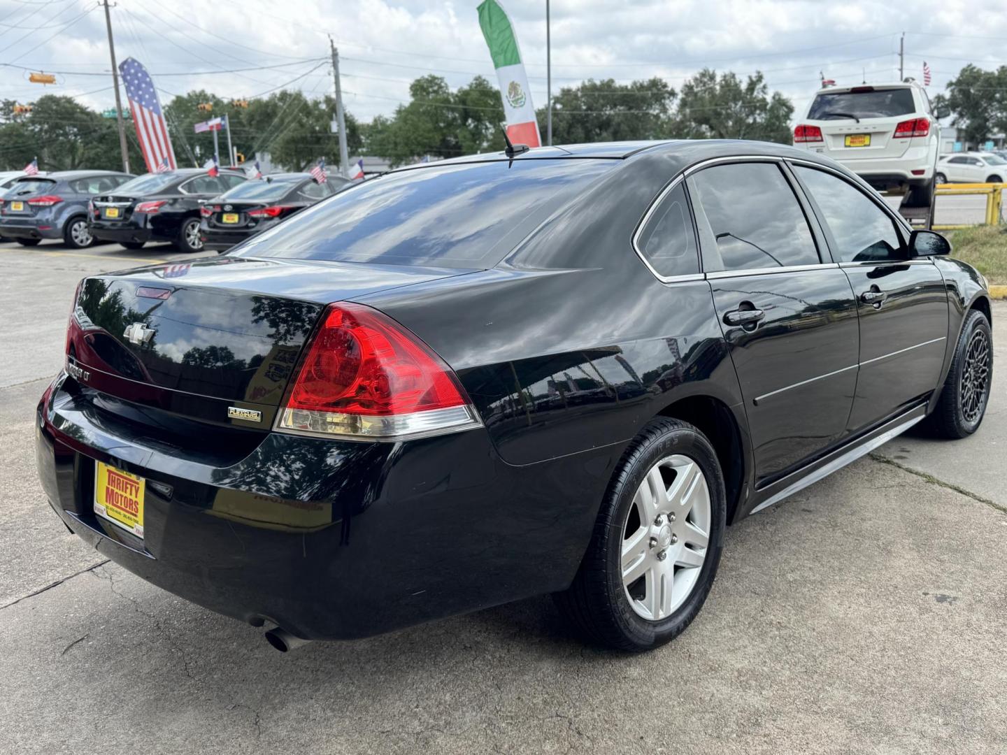 2013 Black /gray Chevrolet Impala LT (Fleet) (2G1WG5E30D1) with an 3.6L V6 DOHC 16V FFV engine, 6-Speed Automatic transmission, located at 16710 Clay Rd., Houston, TX, 77084, (281) 859-7900, 29.834864, -95.656166 - Photo#5