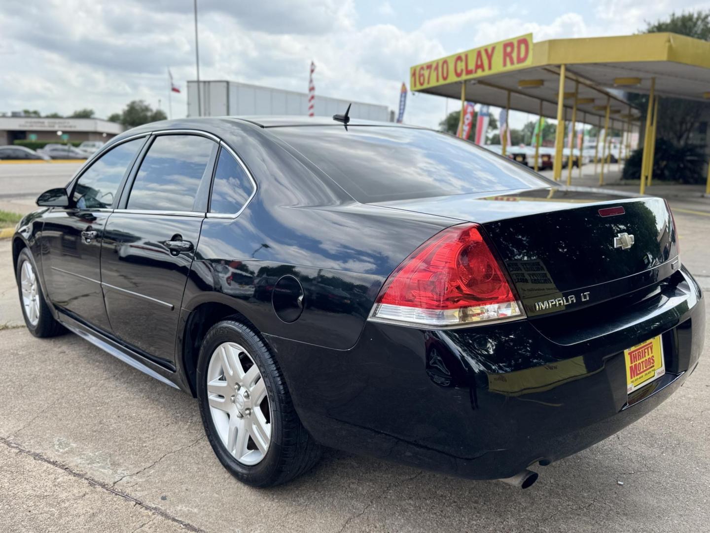 2013 Black /gray Chevrolet Impala LT (Fleet) (2G1WG5E30D1) with an 3.6L V6 DOHC 16V FFV engine, 6-Speed Automatic transmission, located at 16710 Clay Rd., Houston, TX, 77084, (281) 859-7900, 29.834864, -95.656166 - Photo#7
