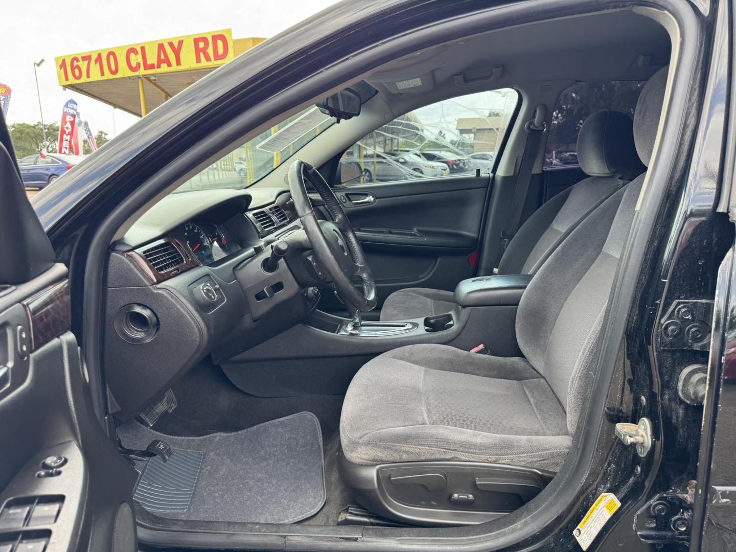 2013 Black /gray Chevrolet Impala LT (Fleet) (2G1WG5E30D1) with an 3.6L V6 DOHC 16V FFV engine, 6-Speed Automatic transmission, located at 16710 Clay Rd., Houston, TX, 77084, (281) 859-7900, 29.834864, -95.656166 - Photo#9