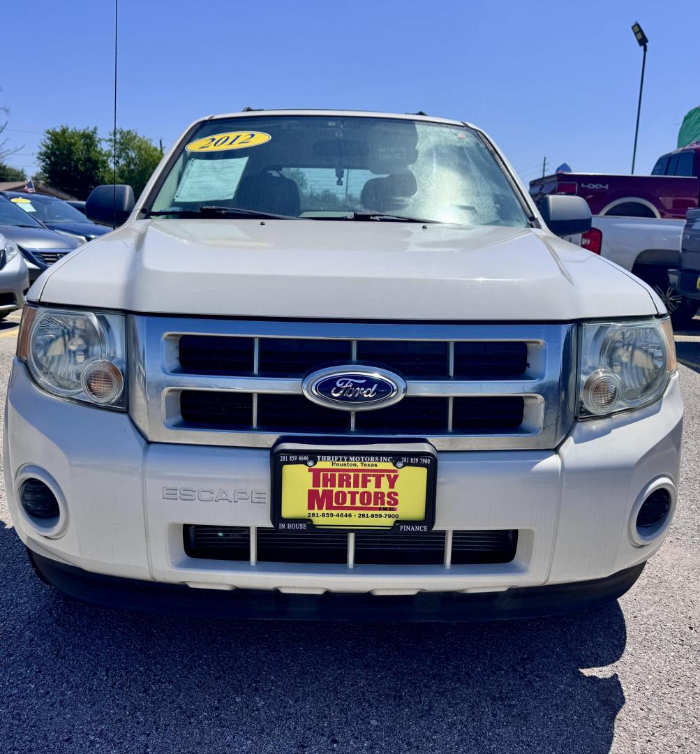2012 White Ford Escape XLS FWD (1FMCU0C78CK) with an 2.5L L4 DOHC 16V engine, Automatic transmission, located at 16710 Clay Rd., Houston, TX, 77084, (281) 859-7900, 29.834864, -95.656166 - Photo#7