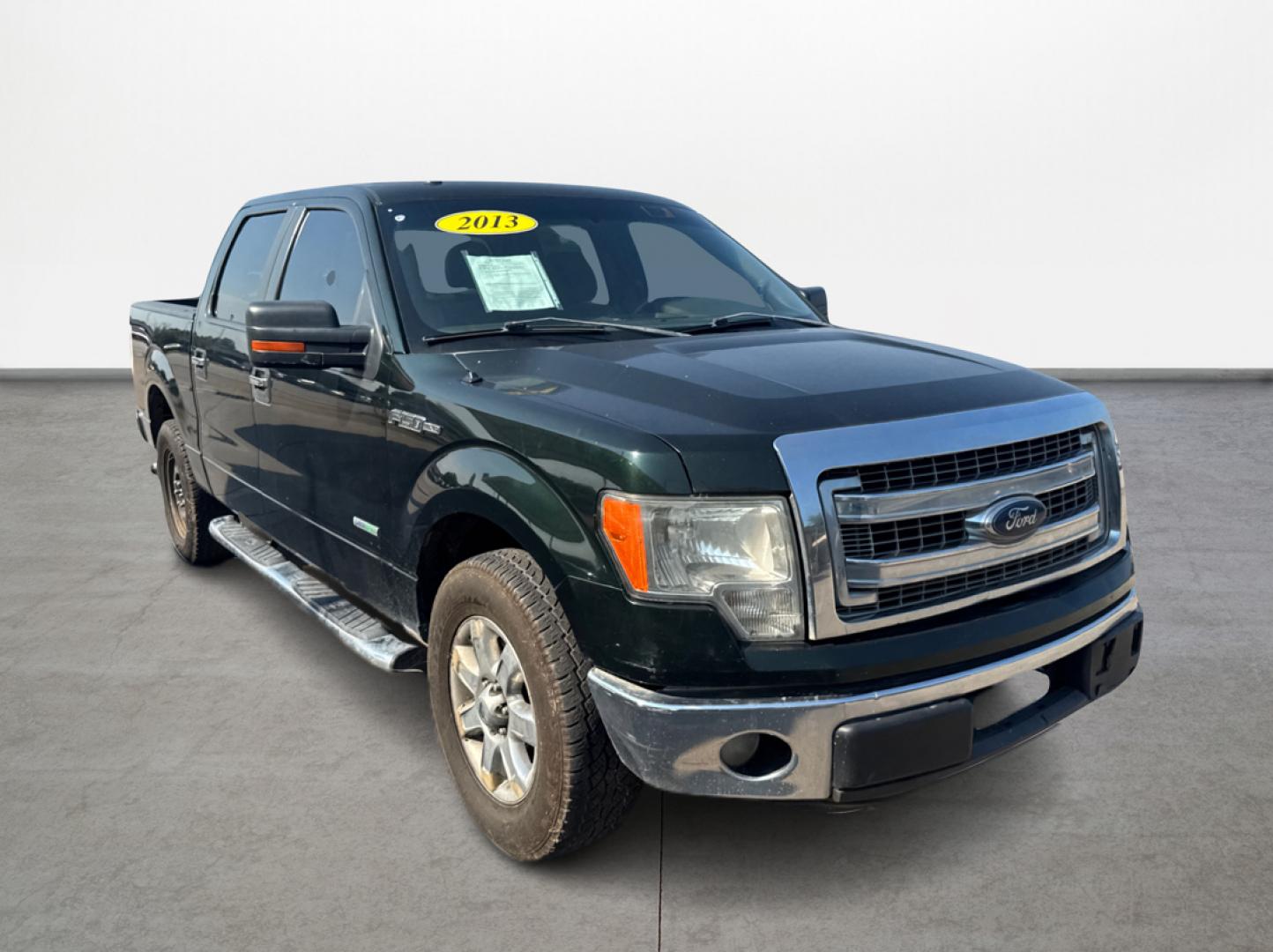 2013 Green /Gray Ford F-150 Platinum SuperCrew 6.5-ft. Bed 2WD (1FTFW1CT4DK) with an 3.5L V6 TURBO engine, 6-Speed Automatic transmission, located at 16710 Clay Rd., Houston, TX, 77084, (281) 859-7900, 29.834864, -95.656166 - Photo#2