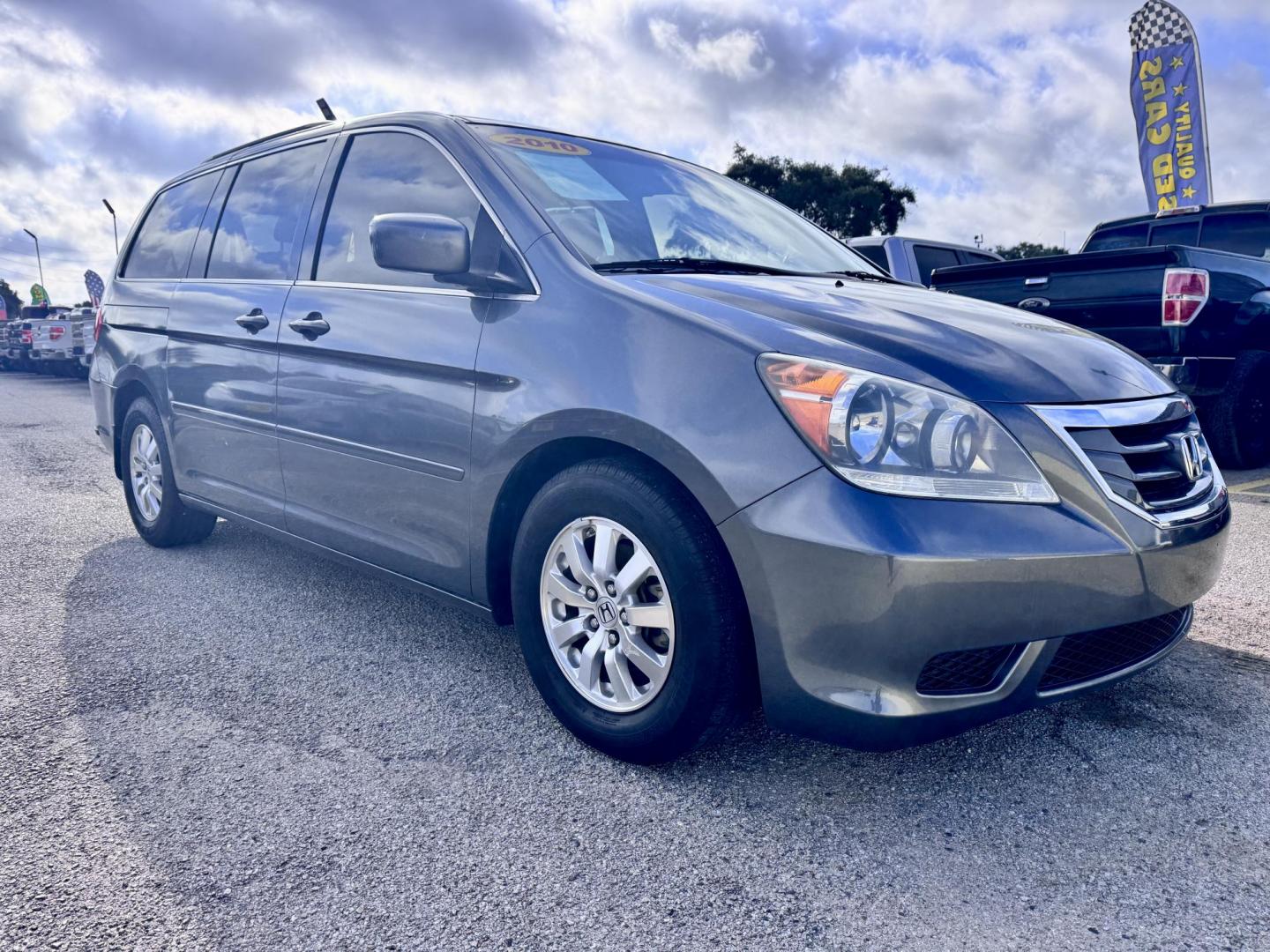 2010 Gray /Gray Honda Odyssey EX-L w/ DVD (5FNRL3H77AB) with an 3.5L V6 SOHC 24V engine, Automatic 5-Speed transmission, located at 16710 Clay Rd., Houston, TX, 77084, (281) 859-7900, 29.834864, -95.656166 - Photo#5