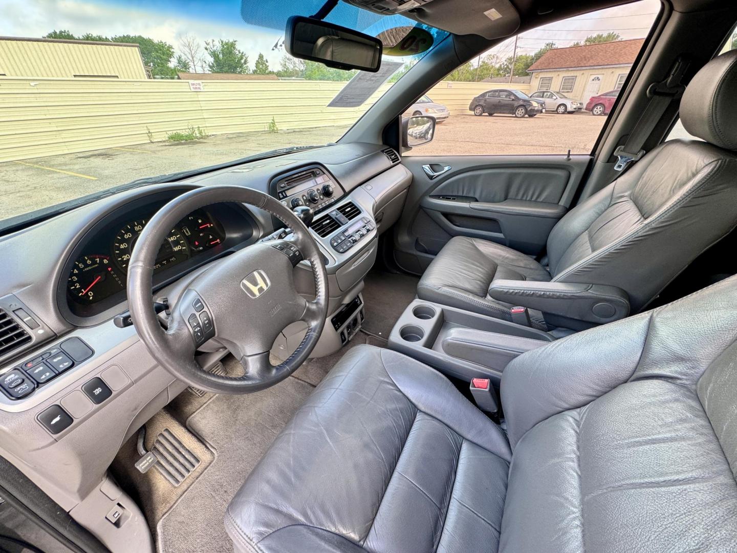 2010 Gray /Gray Honda Odyssey EX-L w/ DVD (5FNRL3H77AB) with an 3.5L V6 SOHC 24V engine, Automatic 5-Speed transmission, located at 16710 Clay Rd., Houston, TX, 77084, (281) 859-7900, 29.834864, -95.656166 - Photo#6