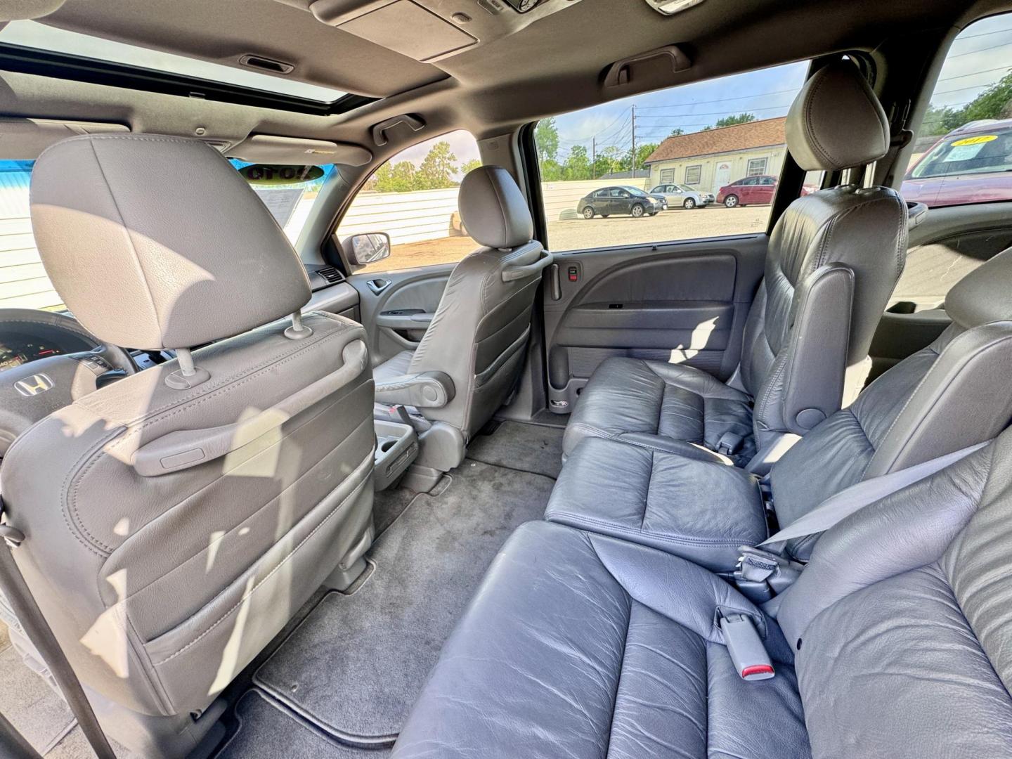 2010 Gray /Gray Honda Odyssey EX-L w/ DVD (5FNRL3H77AB) with an 3.5L V6 SOHC 24V engine, Automatic 5-Speed transmission, located at 16710 Clay Rd., Houston, TX, 77084, (281) 859-7900, 29.834864, -95.656166 - Photo#7