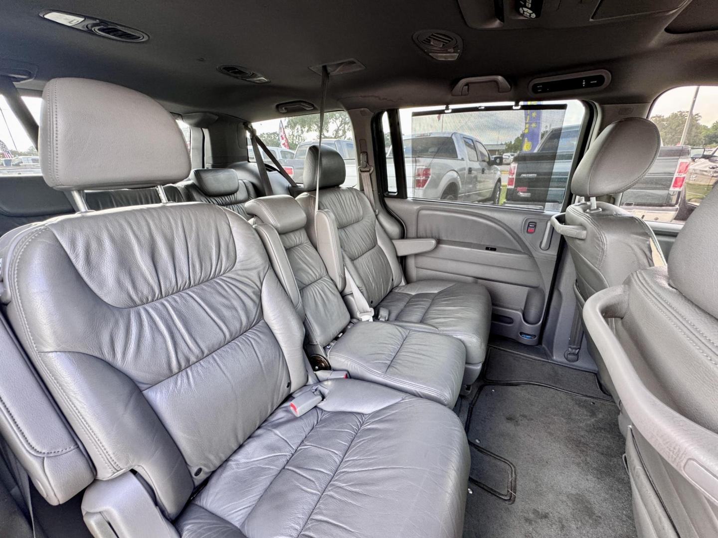 2010 Gray /Gray Honda Odyssey EX-L w/ DVD (5FNRL3H77AB) with an 3.5L V6 SOHC 24V engine, Automatic 5-Speed transmission, located at 16710 Clay Rd., Houston, TX, 77084, (281) 859-7900, 29.834864, -95.656166 - Photo#9