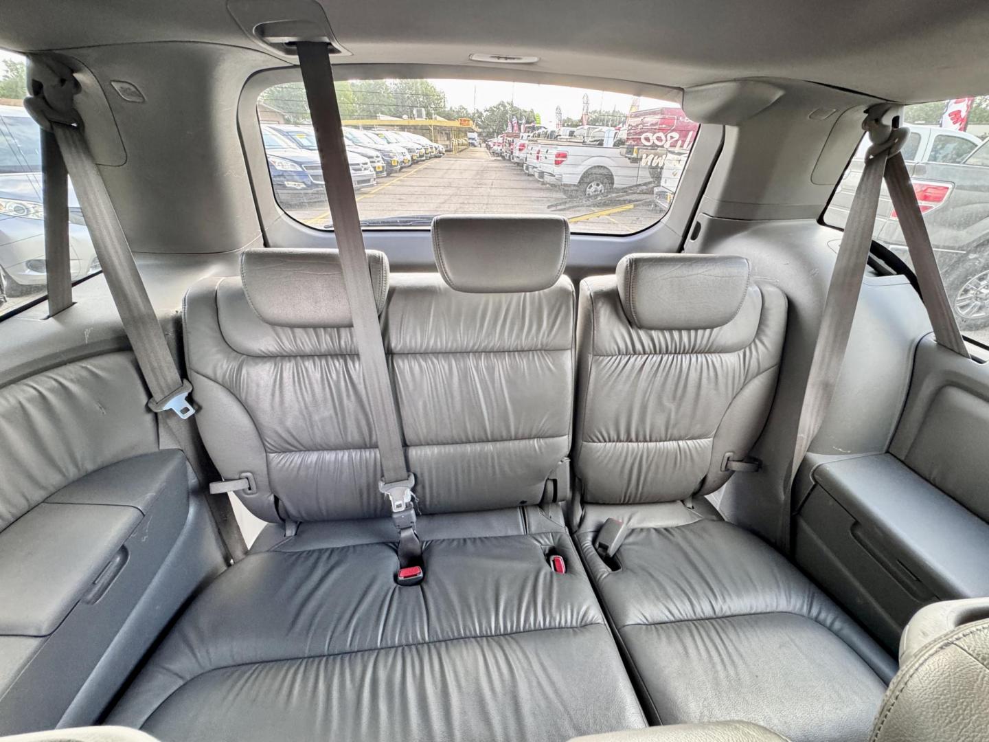 2010 Gray /Gray Honda Odyssey EX-L w/ DVD (5FNRL3H77AB) with an 3.5L V6 SOHC 24V engine, Automatic 5-Speed transmission, located at 16710 Clay Rd., Houston, TX, 77084, (281) 859-7900, 29.834864, -95.656166 - Photo#11