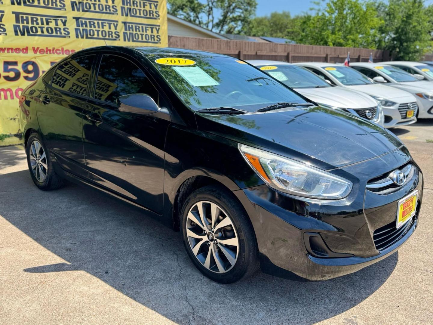 2017 Hyundai Accent SE 4-Door 6M (KMHCT4AE2HU) with an 1.6L L4 DOHC 16V engine, 6M transmission, located at 16710 Clay Rd., Houston, TX, 77084, (281) 859-7900, 29.834864, -95.656166 - Photo#3