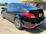 2017 Hyundai Accent SE 4-Door 6M (KMHCT4AE2HU) with an 1.6L L4 DOHC 16V engine, 6M transmission, located at 16710 Clay Rd., Houston, TX, 77084, (281) 859-7900, 29.834864, -95.656166 - Photo#6