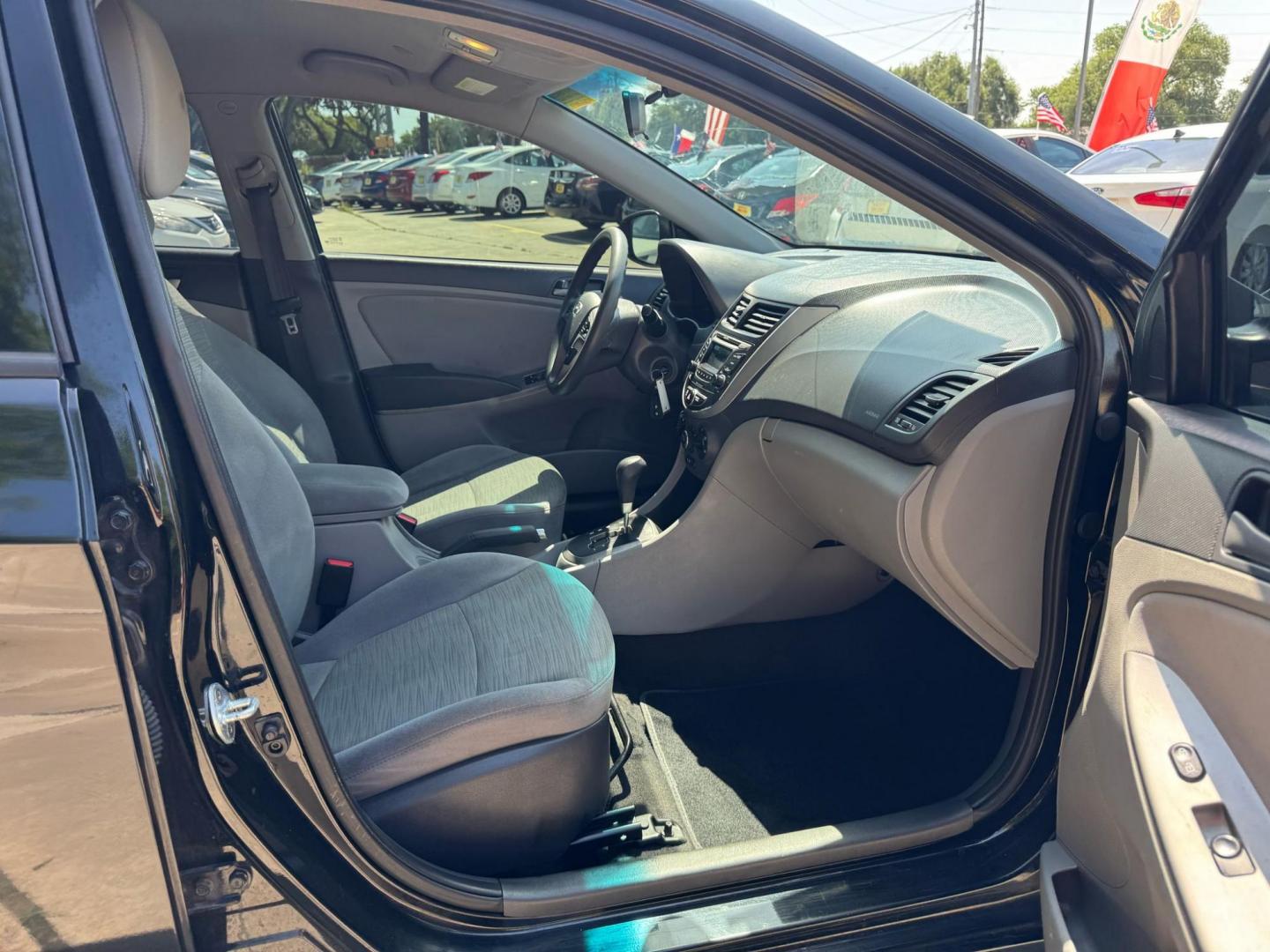 2017 Hyundai Accent SE 4-Door 6M (KMHCT4AE2HU) with an 1.6L L4 DOHC 16V engine, 6M transmission, located at 16710 Clay Rd., Houston, TX, 77084, (281) 859-7900, 29.834864, -95.656166 - Photo#14