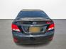 2017 Hyundai Accent SE 4-Door 6M (KMHCT4AE2HU) with an 1.6L L4 DOHC 16V engine, 6M transmission, located at 16710 Clay Rd., Houston, TX, 77084, (281) 859-7900, 29.834864, -95.656166 - Photo#4