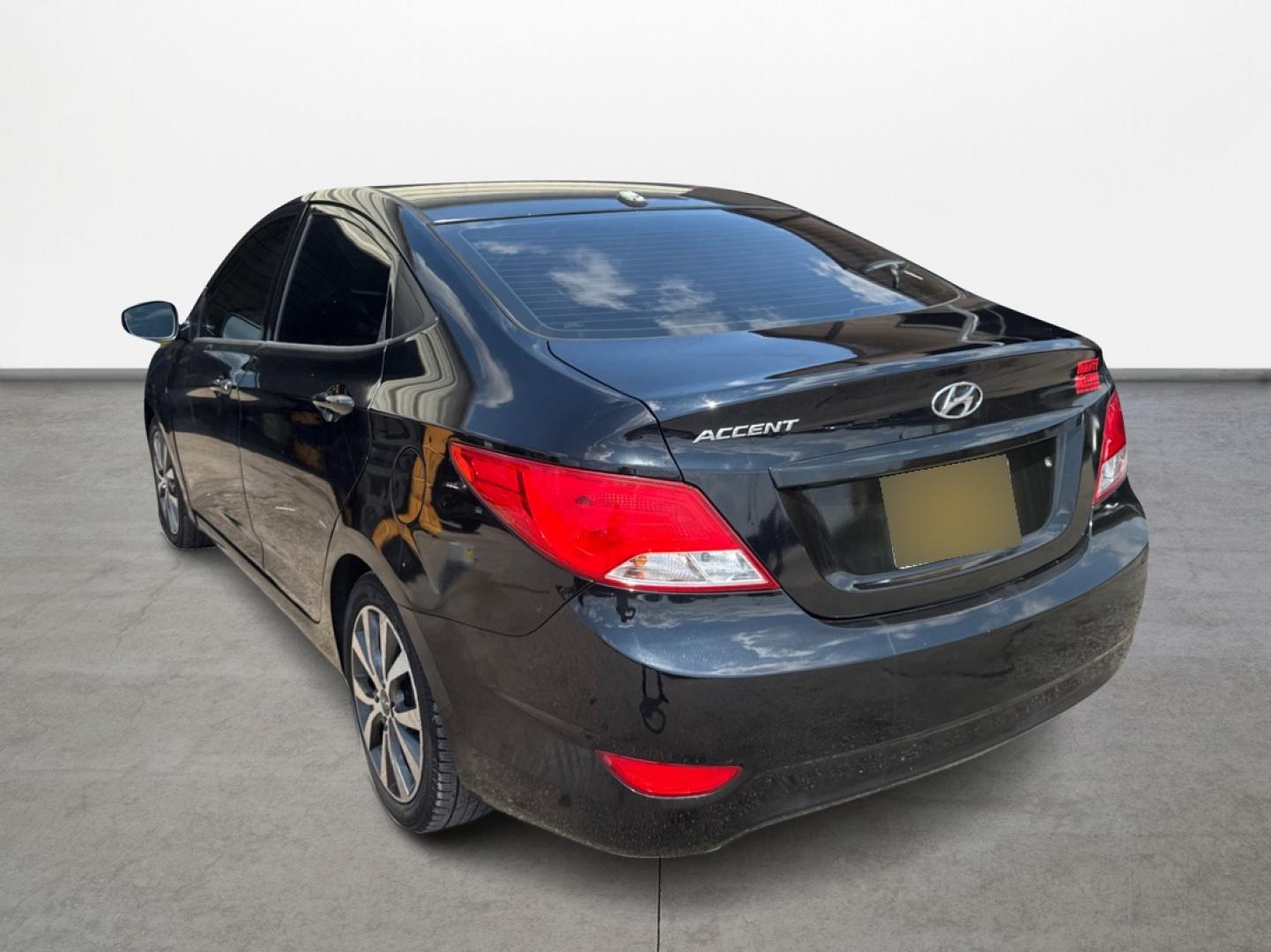 2017 Hyundai Accent SE 4-Door 6M (KMHCT4AE2HU) with an 1.6L L4 DOHC 16V engine, 6M transmission, located at 16710 Clay Rd., Houston, TX, 77084, (281) 859-7900, 29.834864, -95.656166 - Photo#5
