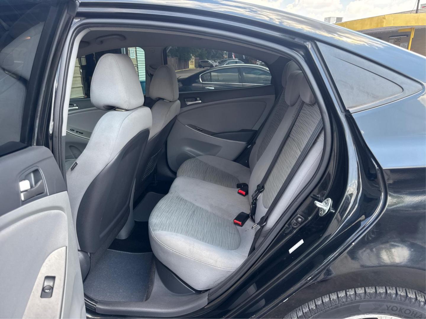 2017 Hyundai Accent SE 4-Door 6M (KMHCT4AE2HU) with an 1.6L L4 DOHC 16V engine, 6M transmission, located at 16710 Clay Rd., Houston, TX, 77084, (281) 859-7900, 29.834864, -95.656166 - Photo#7