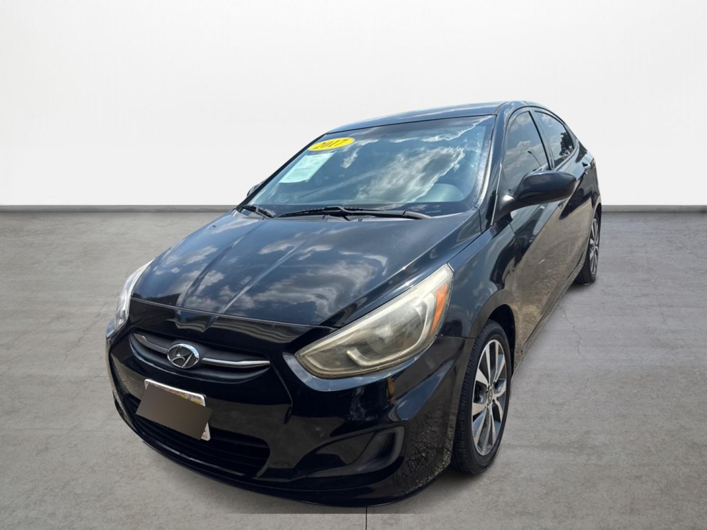 2017 Hyundai Accent SE 4-Door 6M (KMHCT4AE2HU) with an 1.6L L4 DOHC 16V engine, 6M transmission, located at 16710 Clay Rd., Houston, TX, 77084, (281) 859-7900, 29.834864, -95.656166 - Photo#1