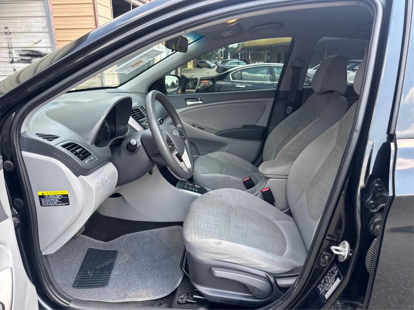2017 Hyundai Accent SE 4-Door 6M (KMHCT4AE2HU) with an 1.6L L4 DOHC 16V engine, 6M transmission, located at 16710 Clay Rd., Houston, TX, 77084, (281) 859-7900, 29.834864, -95.656166 - Photo#10