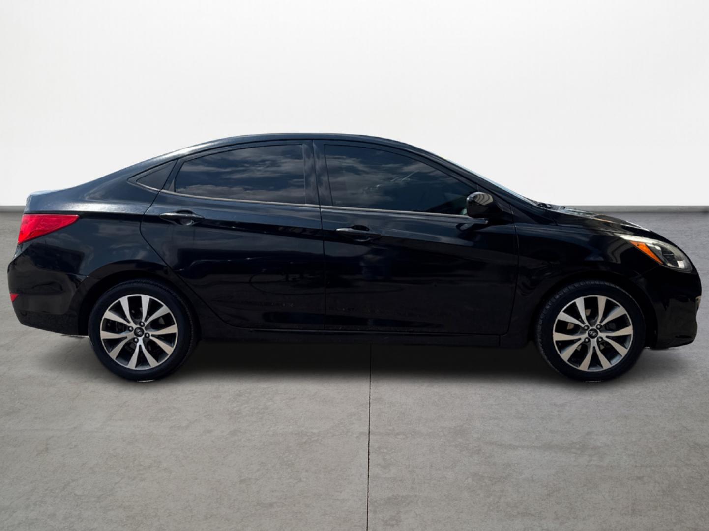 2017 Hyundai Accent SE 4-Door 6M (KMHCT4AE2HU) with an 1.6L L4 DOHC 16V engine, 6M transmission, located at 16710 Clay Rd., Houston, TX, 77084, (281) 859-7900, 29.834864, -95.656166 - Photo#2