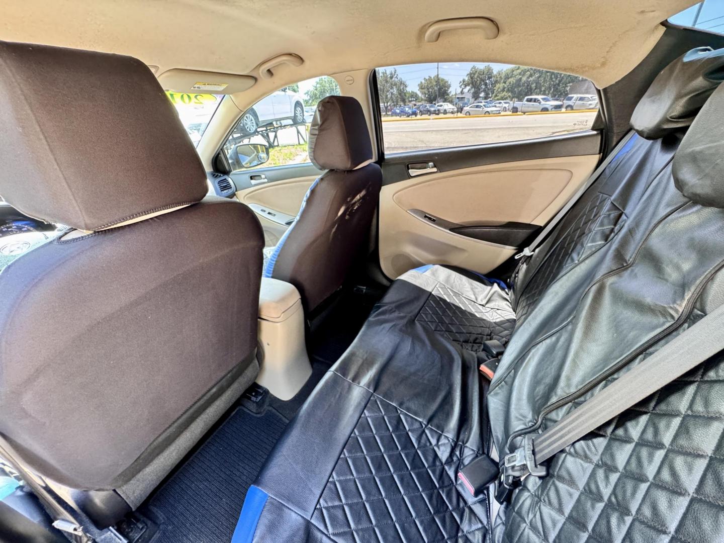 2016 Black /Gray Hyundai Accent SE 4-Door 6A (KMHCT4AE9GU) with an 1.6L L4 DOHC 16V engine, 6A transmission, located at 16710 Clay Rd., Houston, TX, 77084, (281) 859-7900, 29.834864, -95.656166 - Photo#9