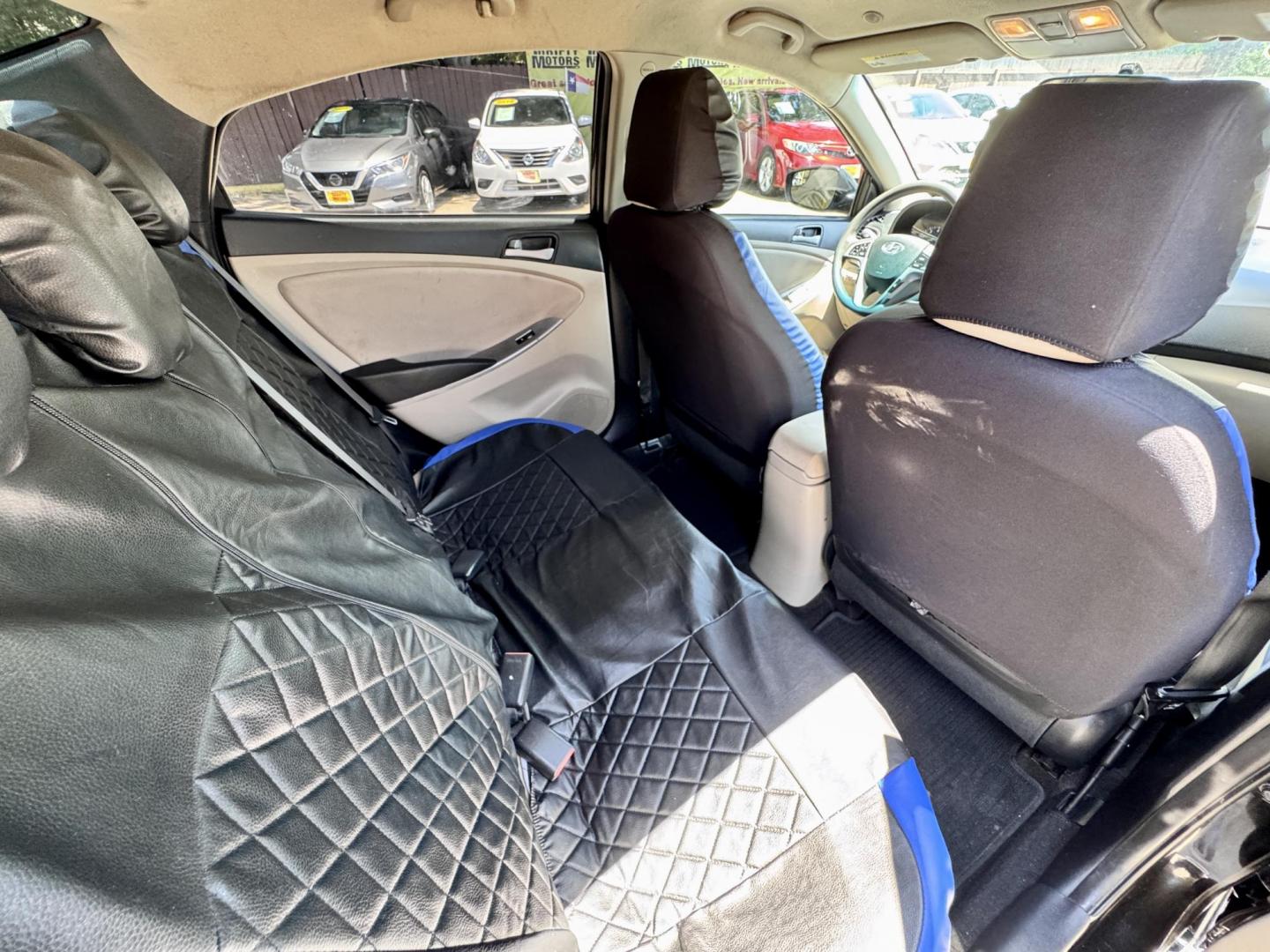 2016 Black /Gray Hyundai Accent SE 4-Door 6A (KMHCT4AE9GU) with an 1.6L L4 DOHC 16V engine, 6A transmission, located at 16710 Clay Rd., Houston, TX, 77084, (281) 859-7900, 29.834864, -95.656166 - Photo#11