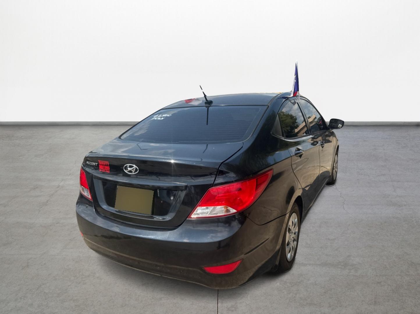 2016 Black /Gray Hyundai Accent SE 4-Door 6A (KMHCT4AE9GU) with an 1.6L L4 DOHC 16V engine, 6A transmission, located at 16710 Clay Rd., Houston, TX, 77084, (281) 859-7900, 29.834864, -95.656166 - Photo#4